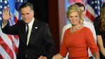 US Republican presidential candidate Mitt Romney and his wife Ann walk off stage after Romney conceded defeat to President Barack Obama on November 7, 2012 in Boston. Obama swept to re-election, forging history again by transcending a slow economic recovery and the high unemployment which haunted his first term to beat Republican Mitt Romney.
