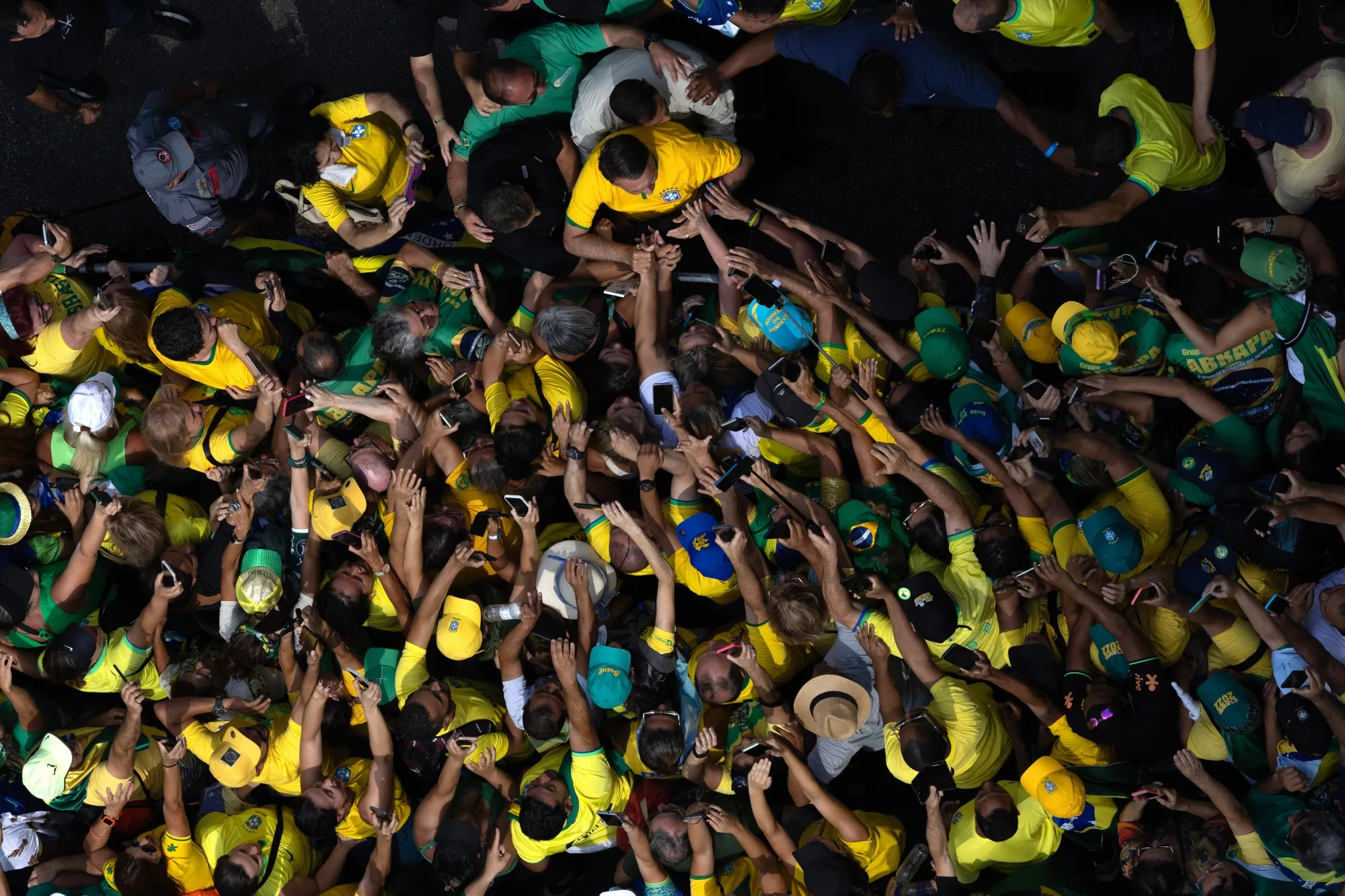 Jair Bolsonaro arrives at a rally in Sao Paulo on Sunday.