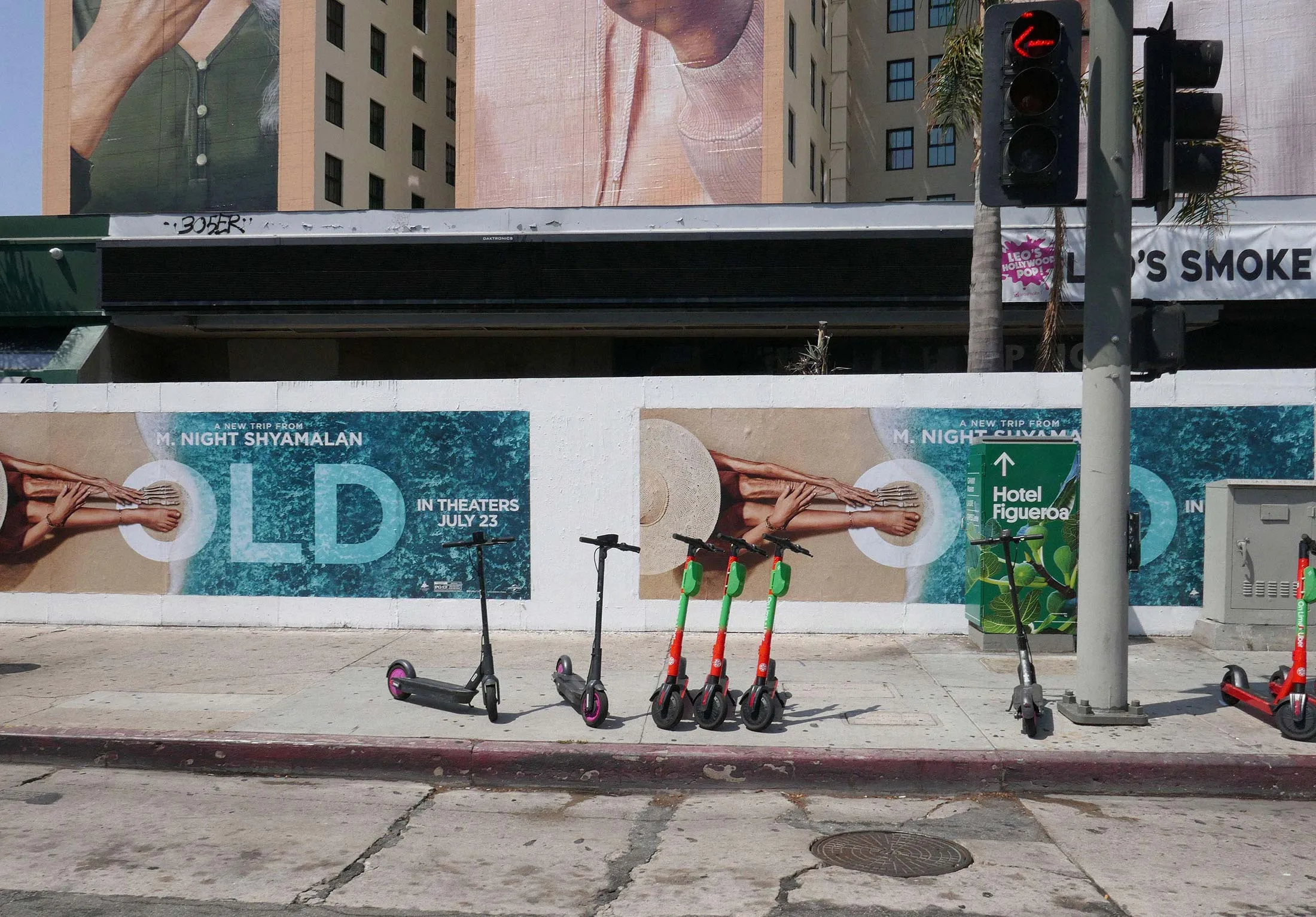 Scooters on a Los Angeles sidewalk.