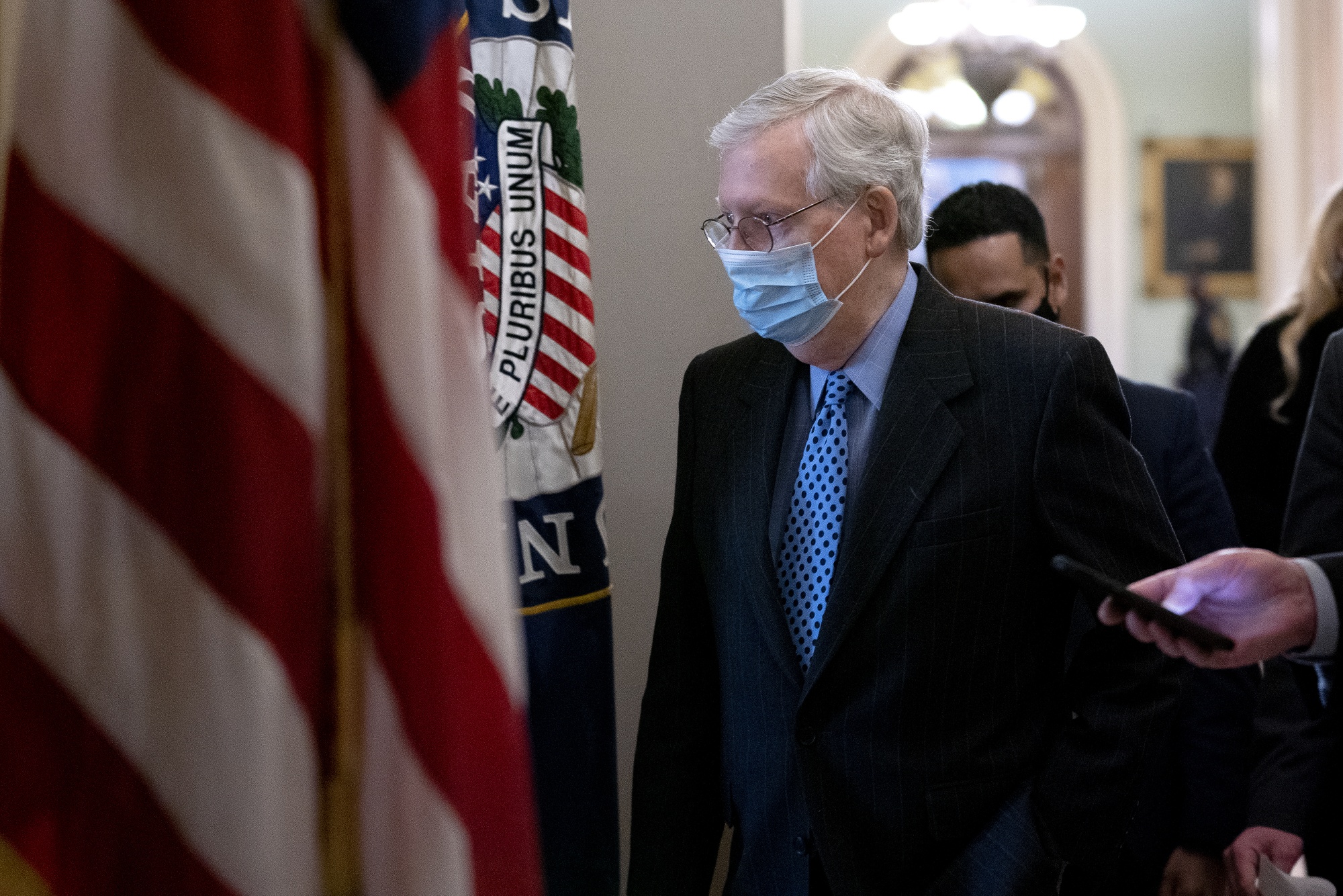 Mitch McConnell walks to his office at the U.S. Capitol on Jan. 21.