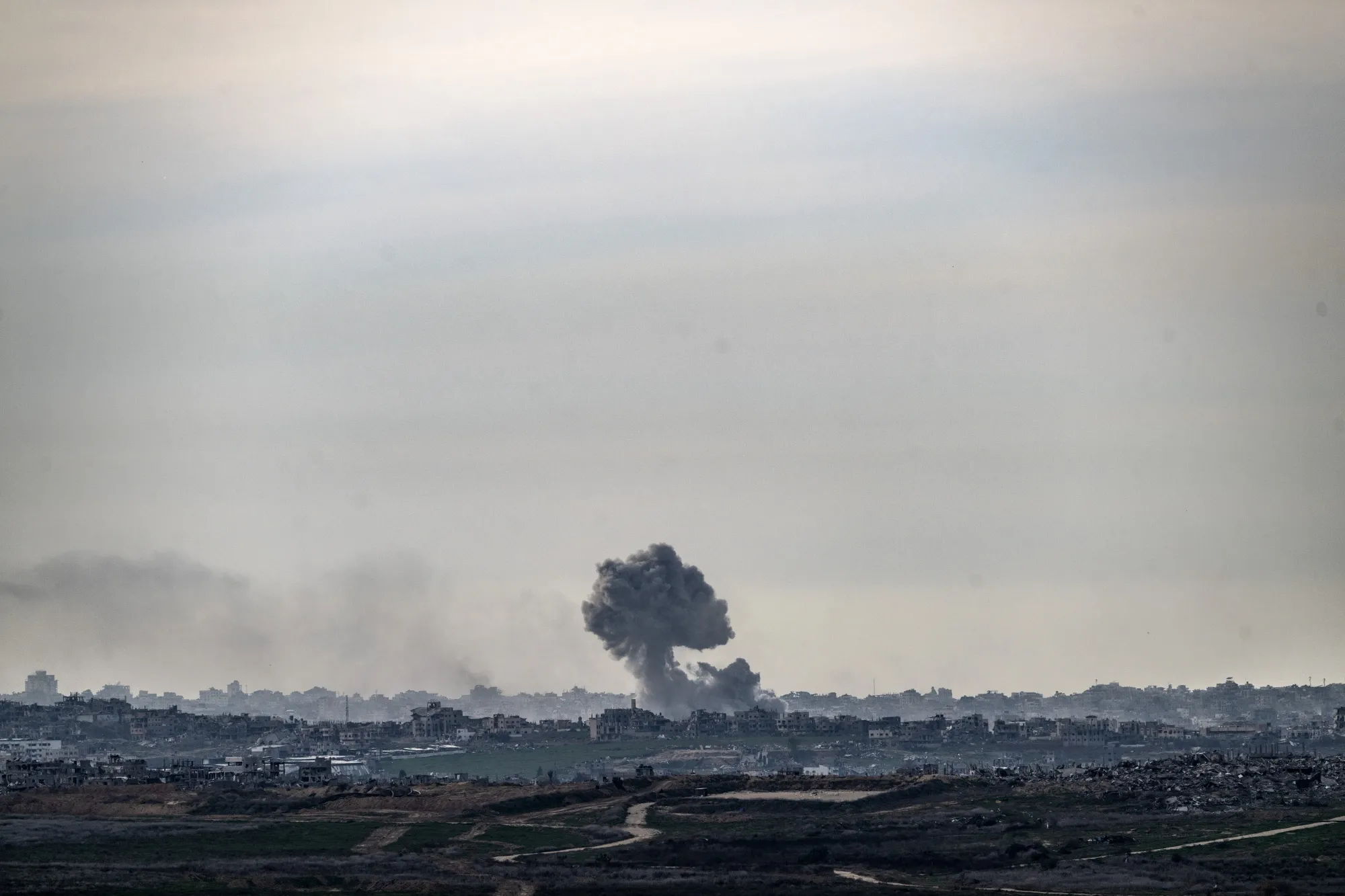Smoke rises over a residential area following an Israeli airstrike in Gaza,&nbsp;on Jan. 14.