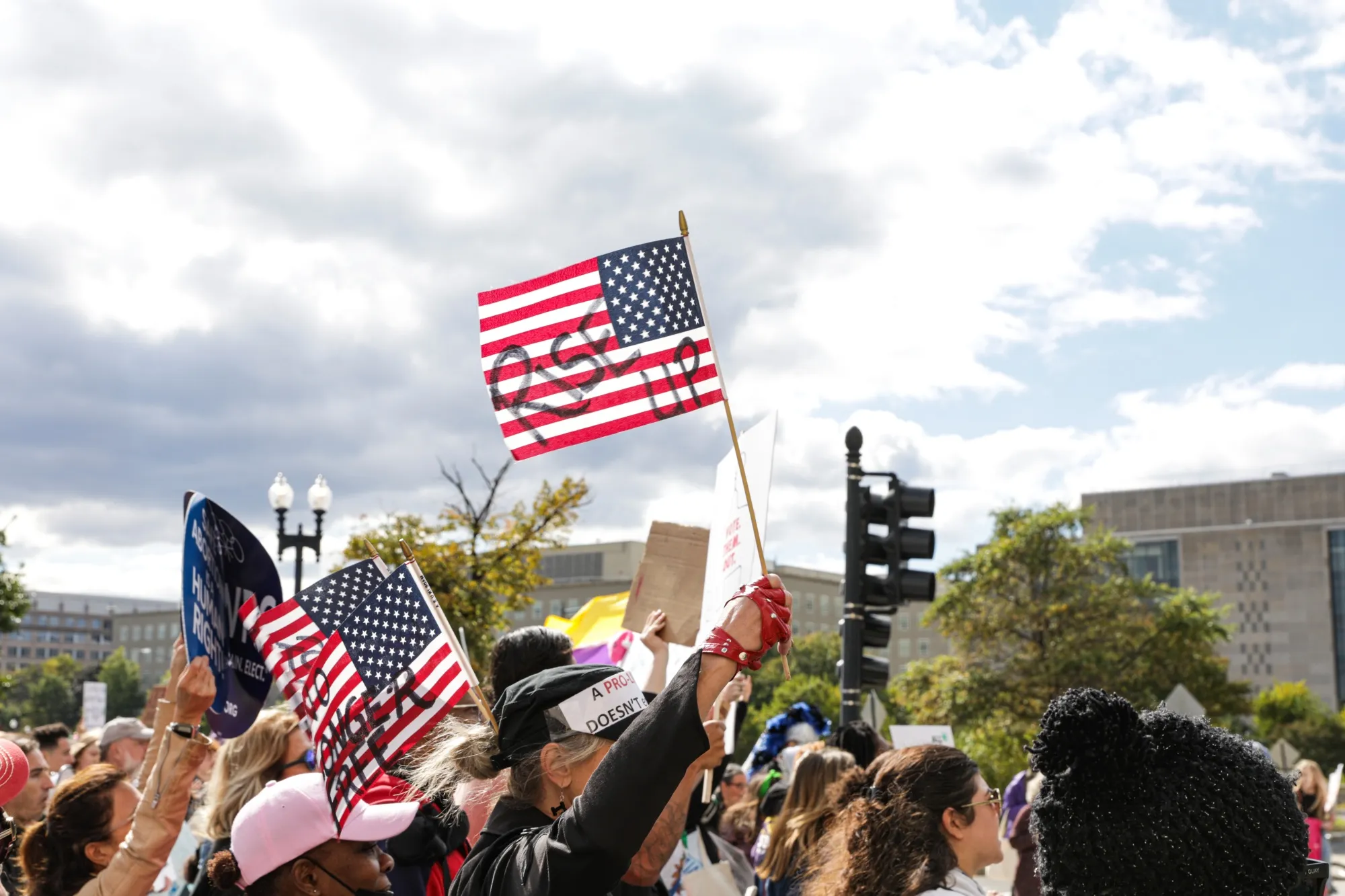 Abortion rights demonstrators during a Women's March in Washington, DC, US, on Saturday, Oct. 8, 2022. On October 8th, exactly one month before Election Day, women and their allies marched across the country for a massive nationwide "Women's Wave" day of action meant to rally supporters of reproductive rights ahead of the 2022 midterms.
