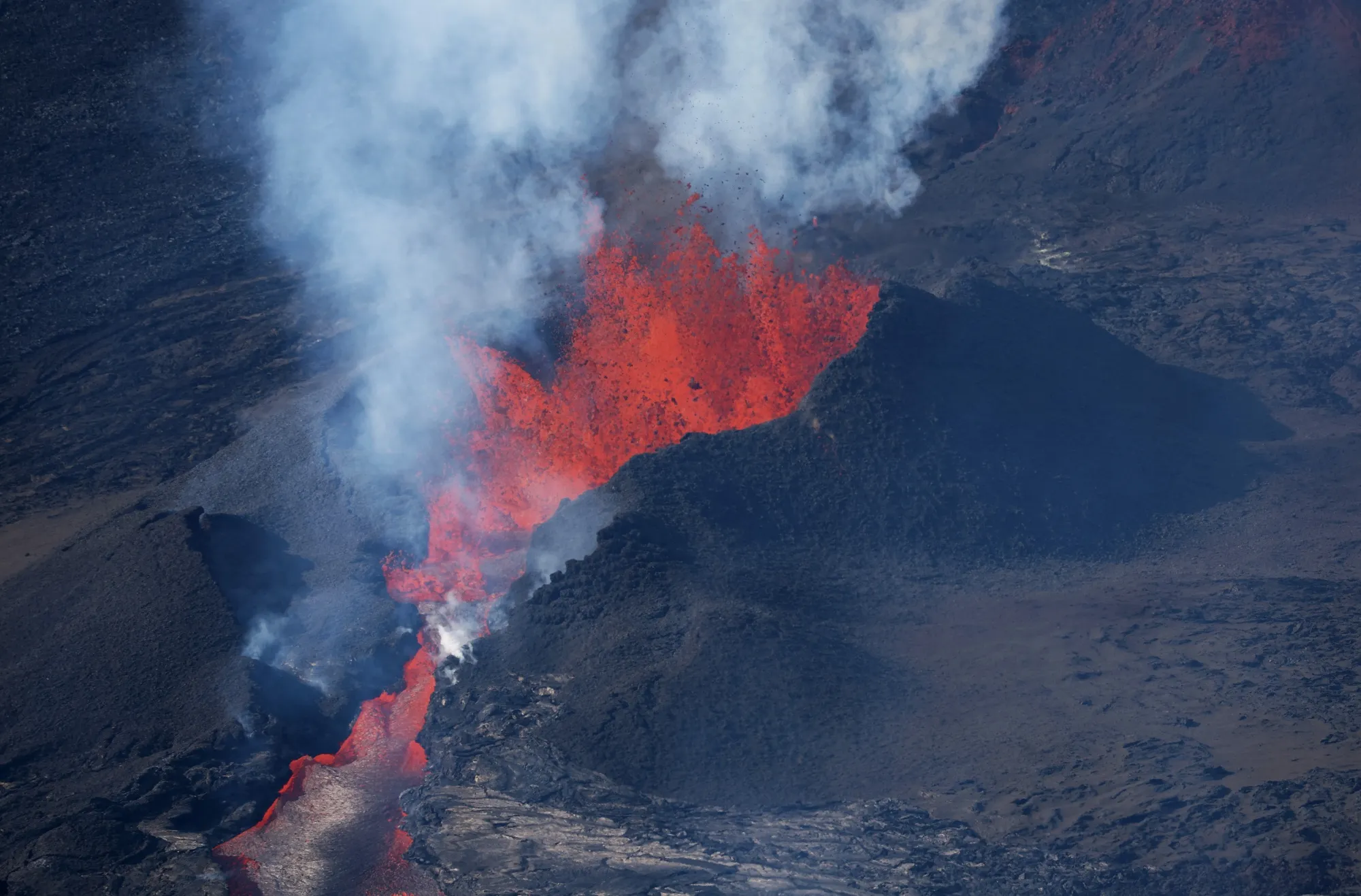 Lava shoots up from a fissure of Mauna Loa Volcano as it erupts on Dec. 5.