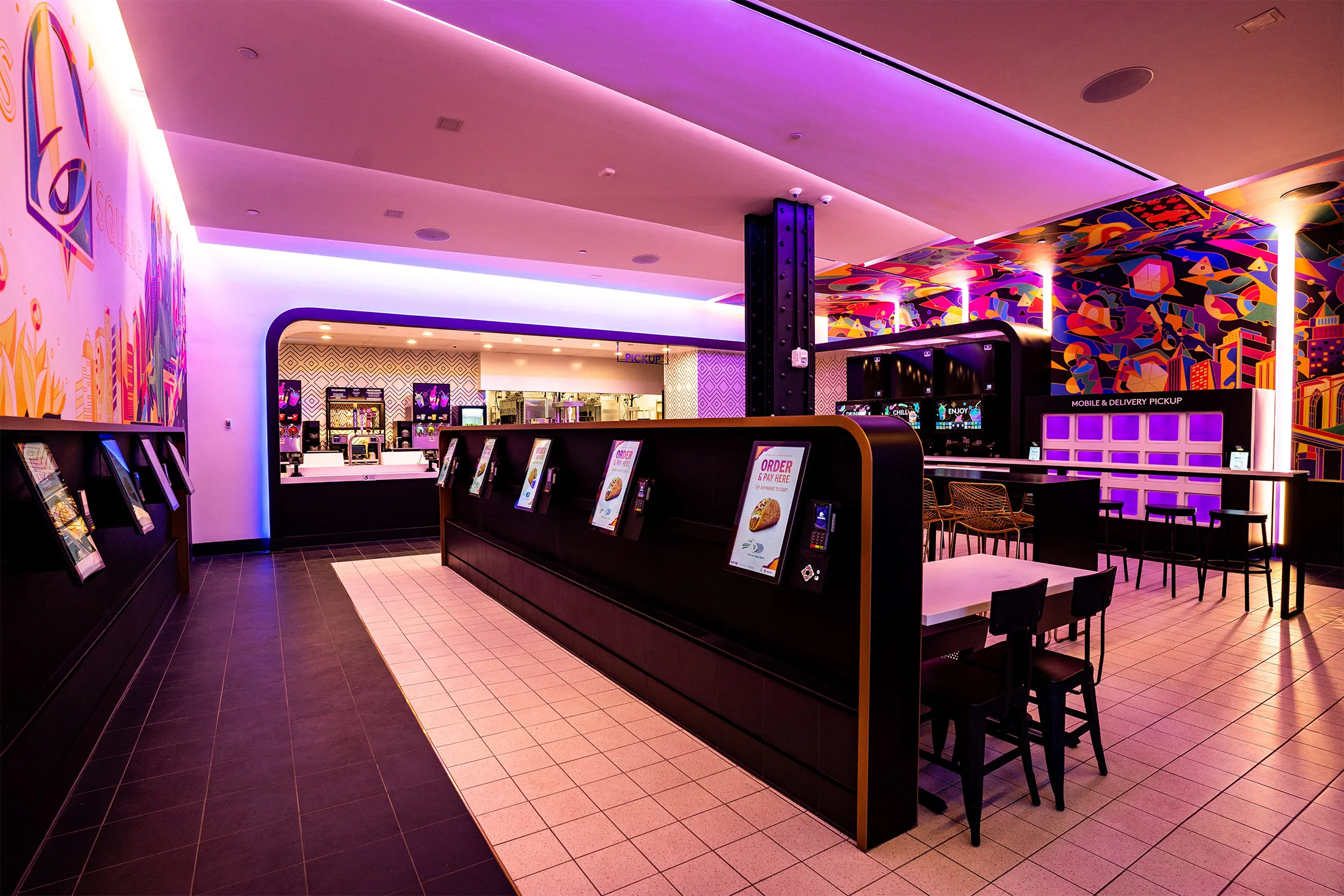 Taco Bell’s fully digital Cantina in the Times Square neighborhood of New York includes contactless order ahead pickup cubbies, right.