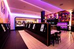 Taco Bell’s fully digital Cantina in the Times Square neighborhood of New York includes contactless order ahead pickup cubbies, right.