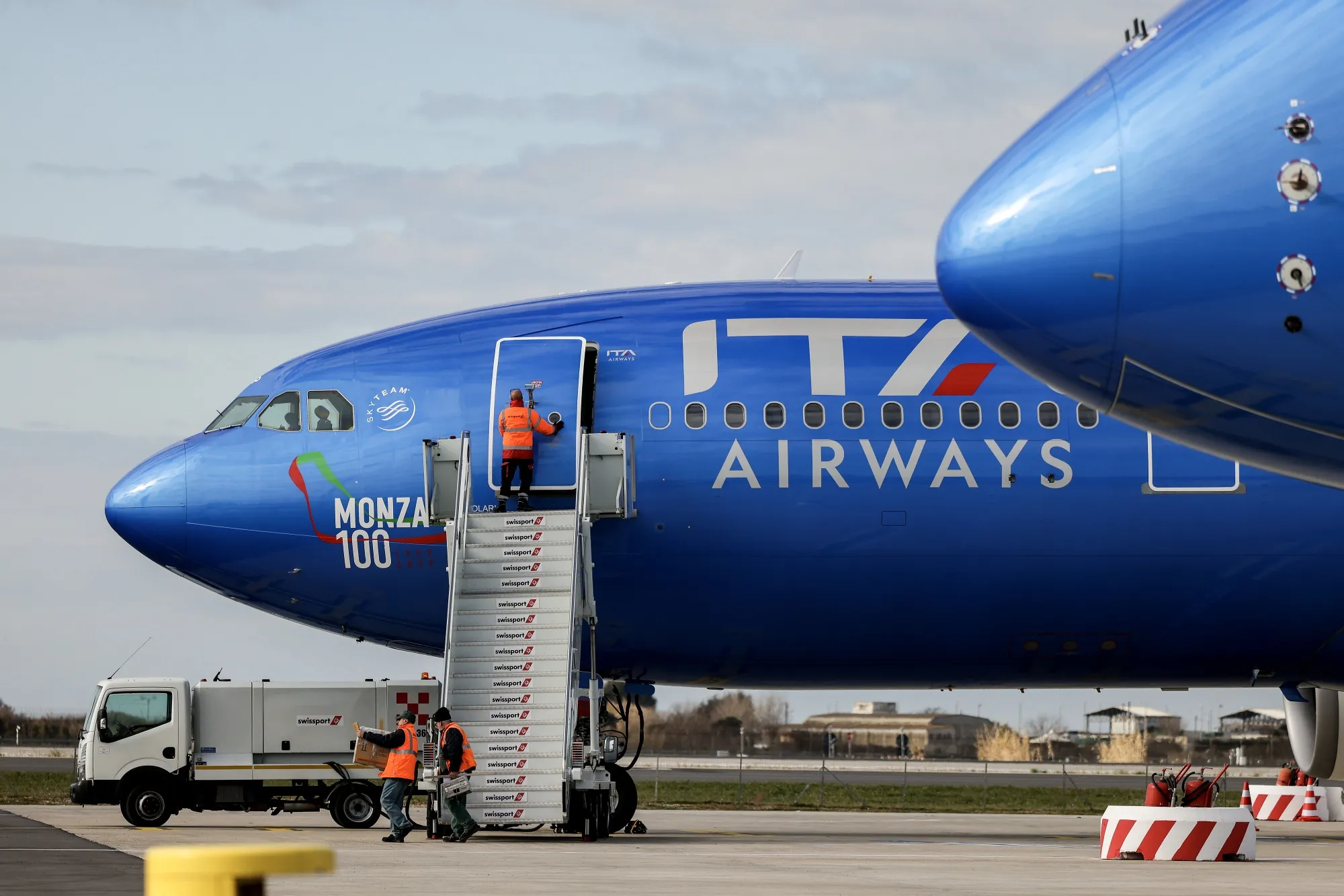 An ITA Airways aircraft on the tarmac at Fiumicino airport in Rome.