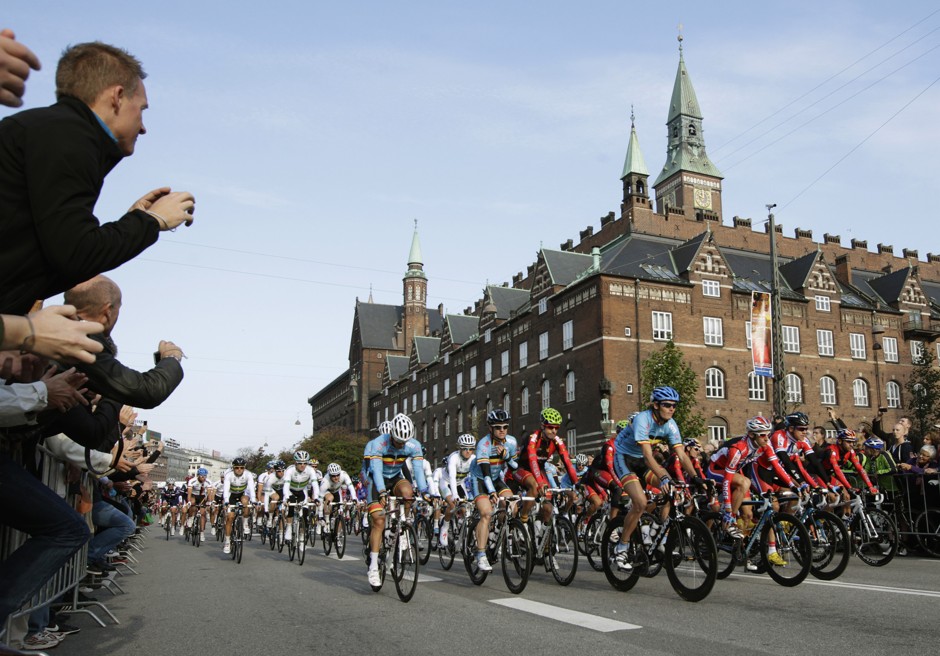 Riders passing Copenhagen's City Hall during the UCI World Cycling Championships.