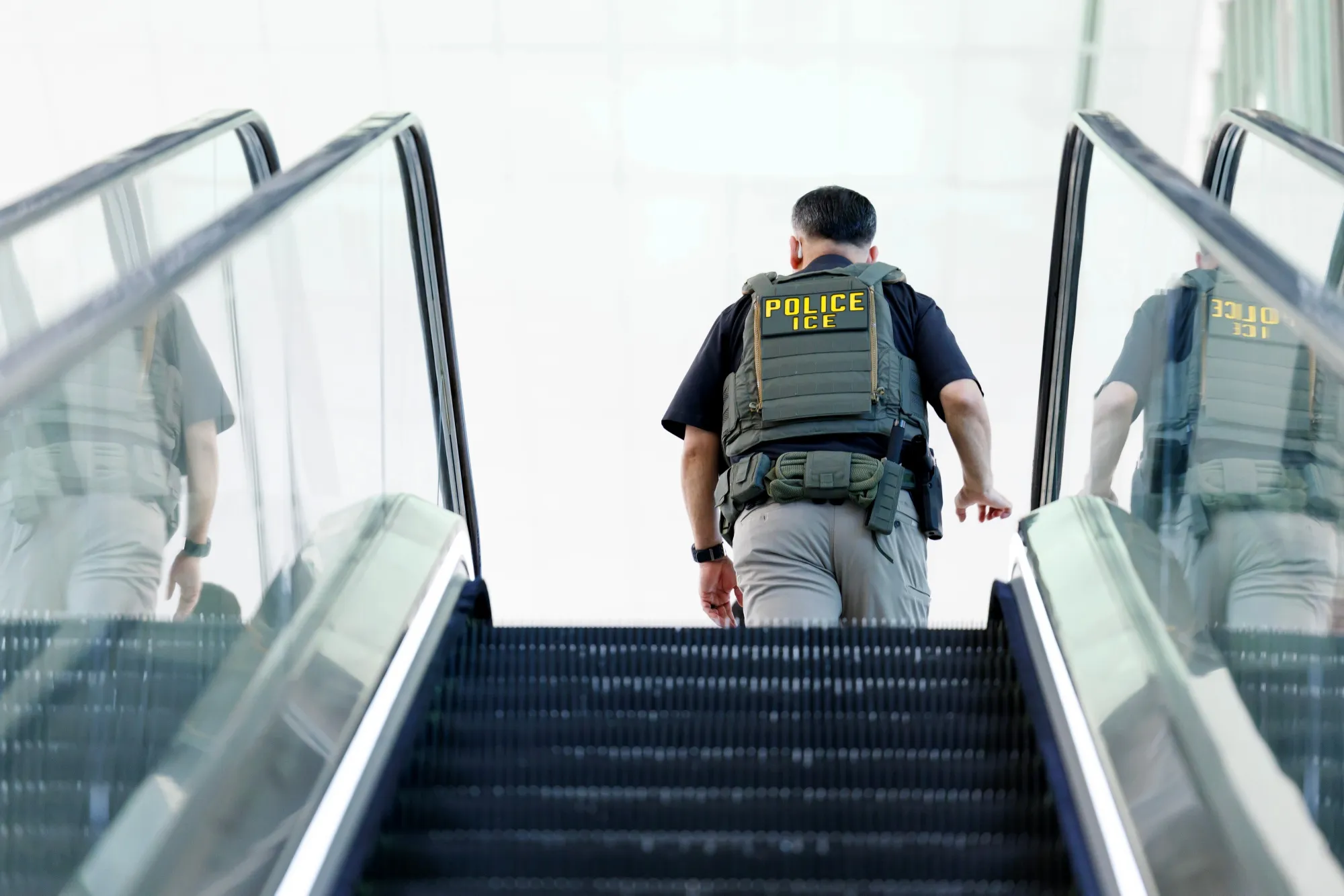 An ICE&nbsp;agent at George Bush Intercontinental Airport in Houston.