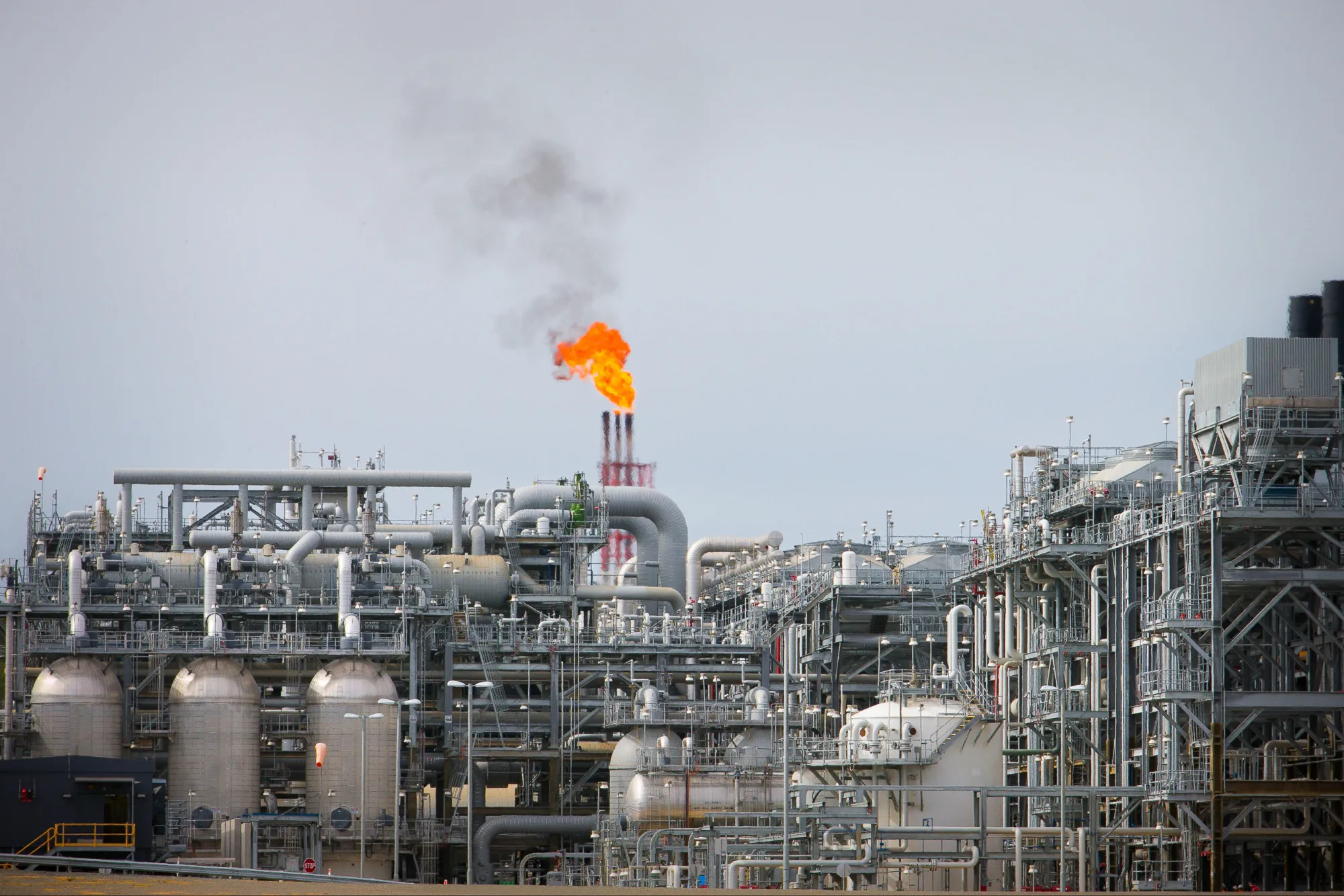 A flame blazes on top of flare stacks at an LNG site in Australia,&nbsp;one of the world’s top LNG exporters.