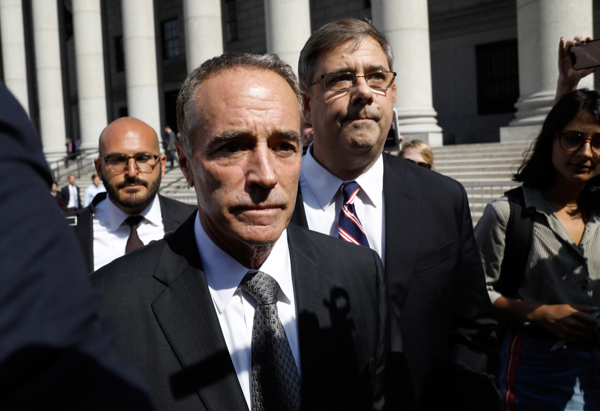 Chris Collins exits federal court in New York on Aug. 8, 2018.