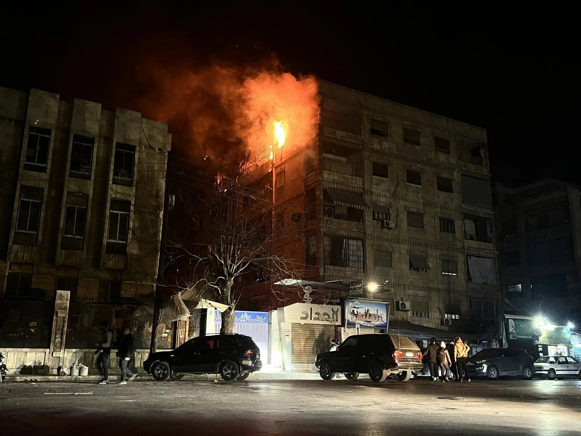 Flames rise from a building hit in an attack carried out by Syrian Democratic Forces&nbsp;in Aleppo, Syria on Dec. 22.
