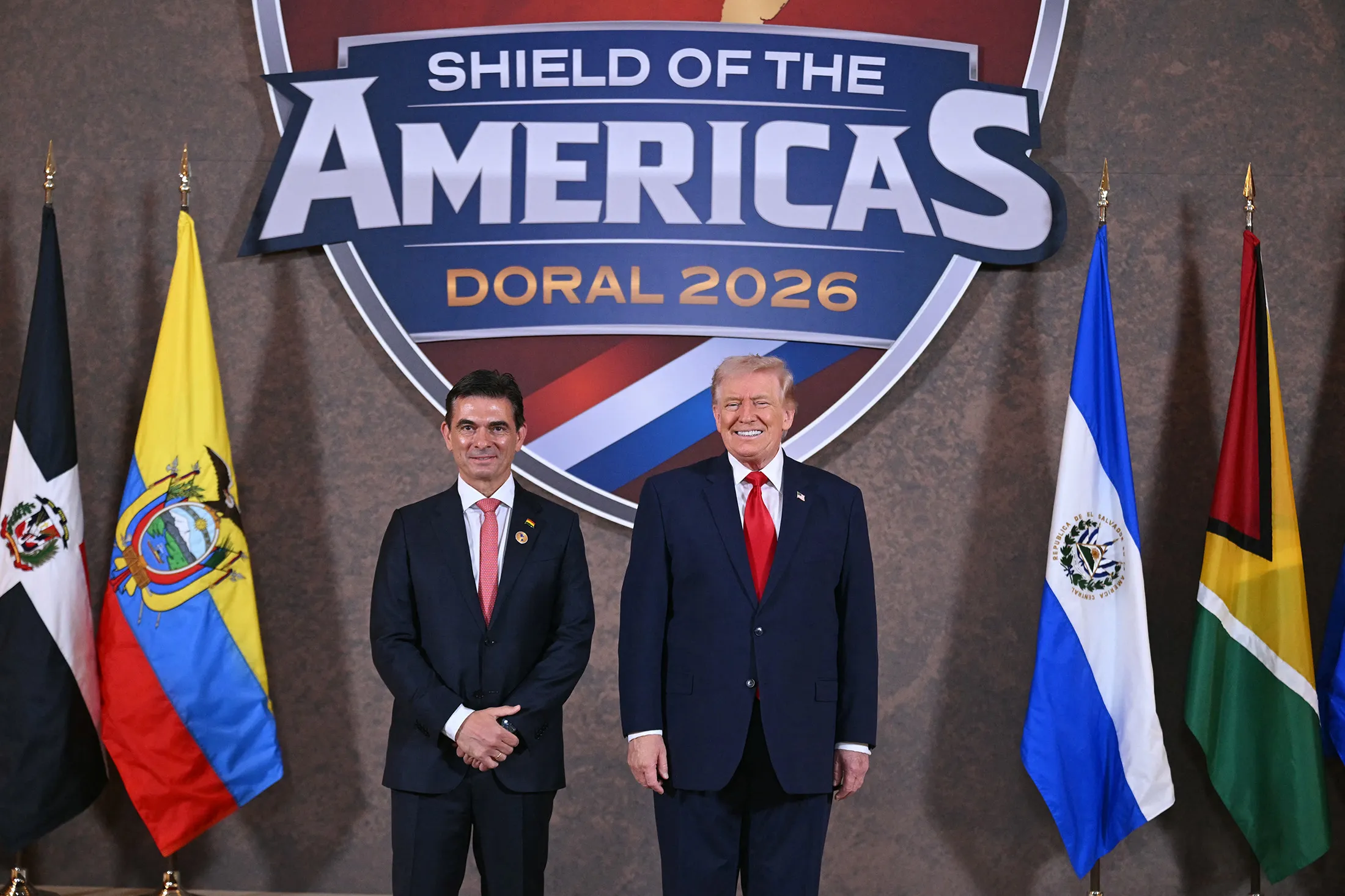 Presidents Donald Trump, right, and Rodrigo Paz pose for a photo at the“Shield of the Americas” Summit at Trump National Doral on March 7.
