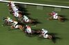 Horses gallop on the track during a race at the Hong Kong Jockey Club's Happy Valley racecourse in Hong Kong, China, on Wednesday, June 14, 2017. One of the city's most-venerable institutions, the Hong Kong Jockey Club, which has been called an "ATM for the government" for its huge contributions to the city's tax coffers and charity efforts, is facing trouble. Disinterest among many young people and an upcoming bridge link to the glittering casinos of Macau threaten the future of the money-spinning gambling monopoly.