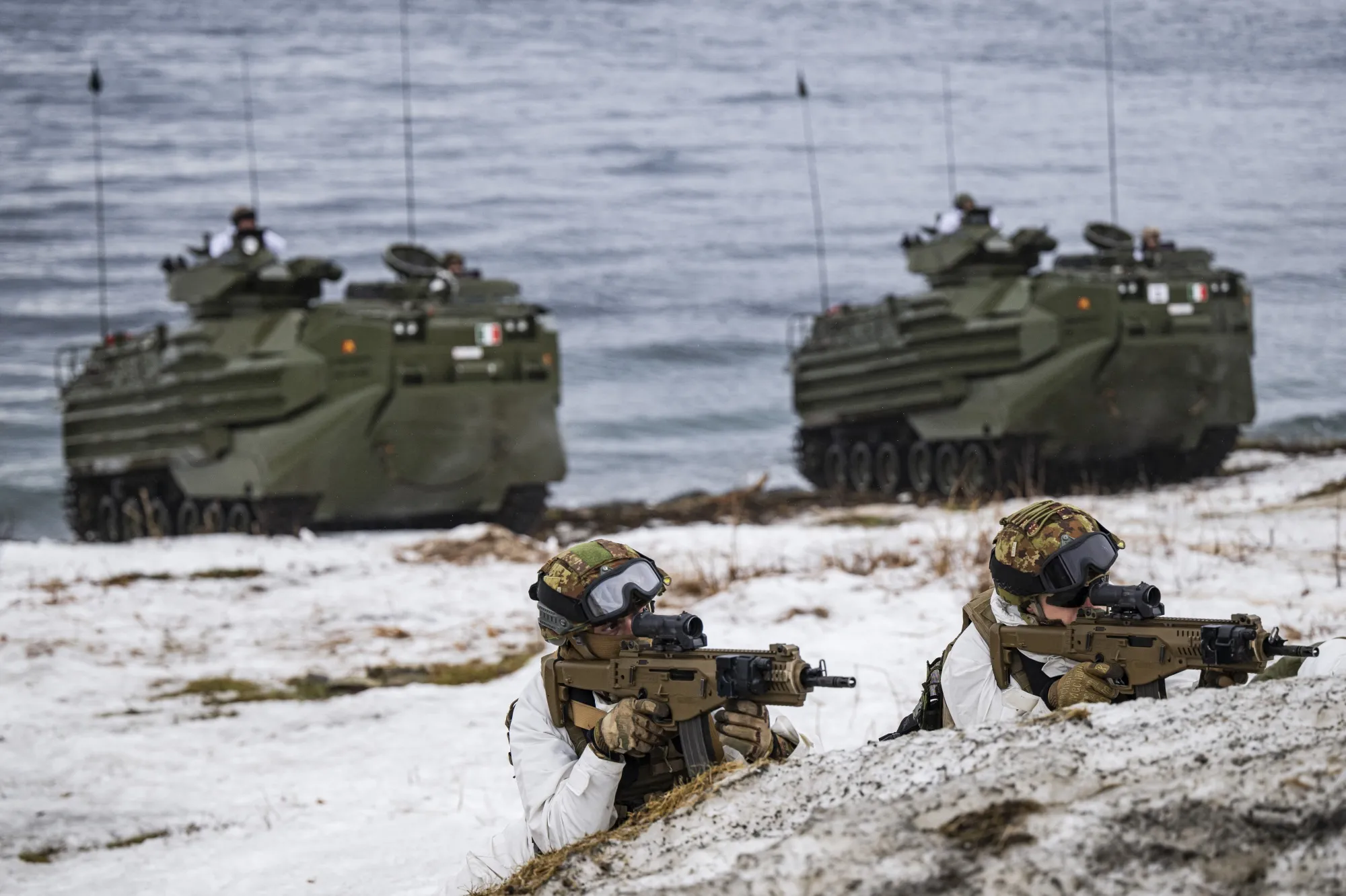 Italian Marines take position during an amphibious assault demonstration at sea near Sorstraumen&nbsp;in Norway.&nbsp;
