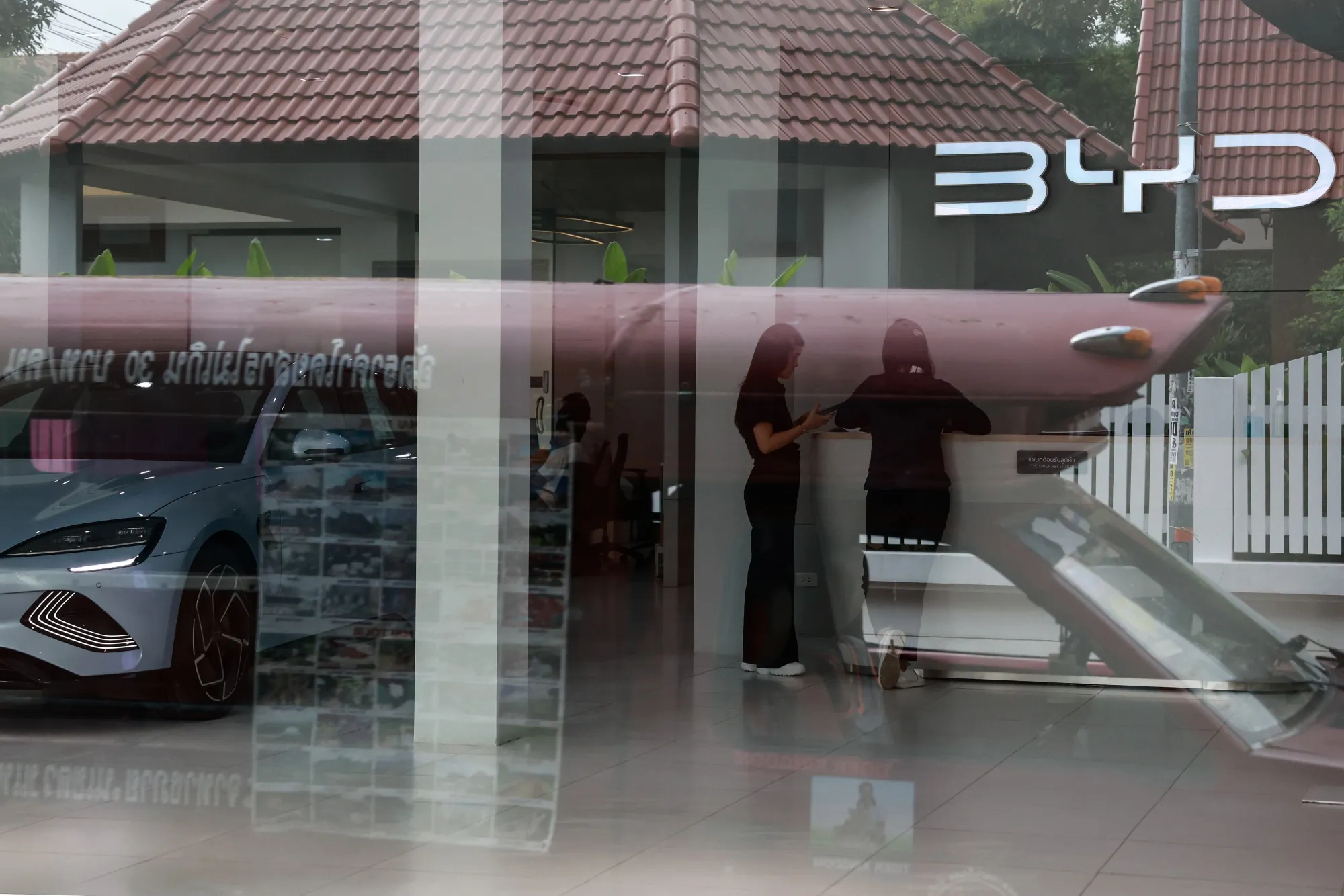 People inside a BYD Co. showroom in Chiang Mai, Thailand, on Wednesday, Aug. 7, 2024. Tourism is one of Thailand’s key industries accounting for about 20% of total jobs and making up roughly 12% of the nation’s $500 billion economy.