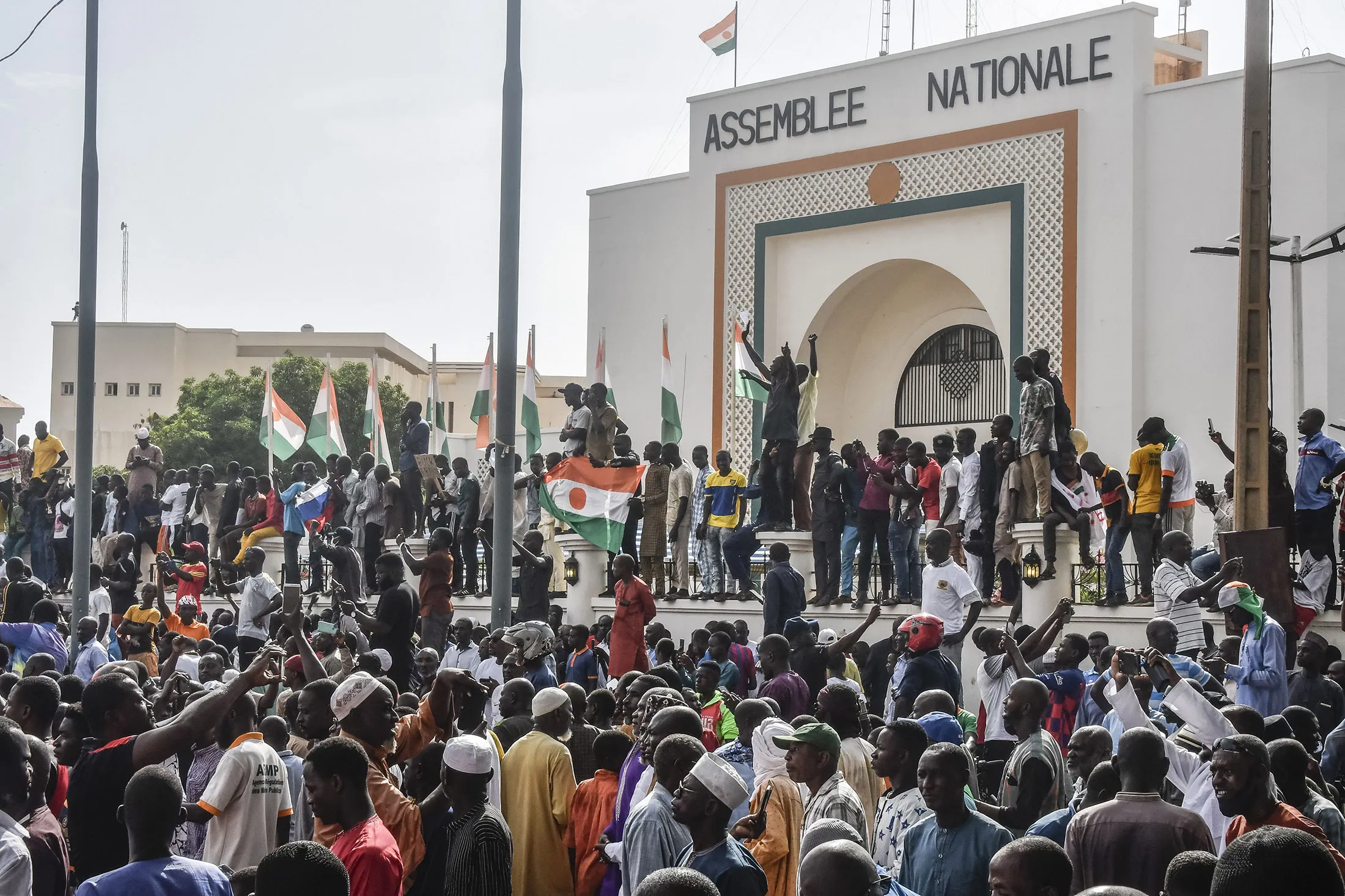 Supporters rally in support of Niger's junta in front of the National Assembly in Niamey on July 30.