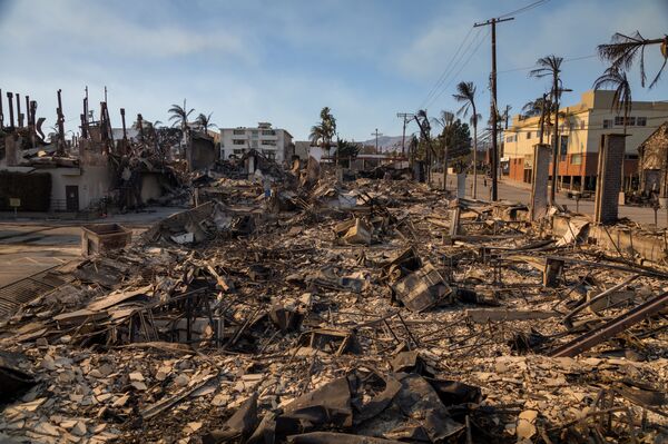 LA Fire Crews Make Strides In Fighting Blazes As Toll Climbs