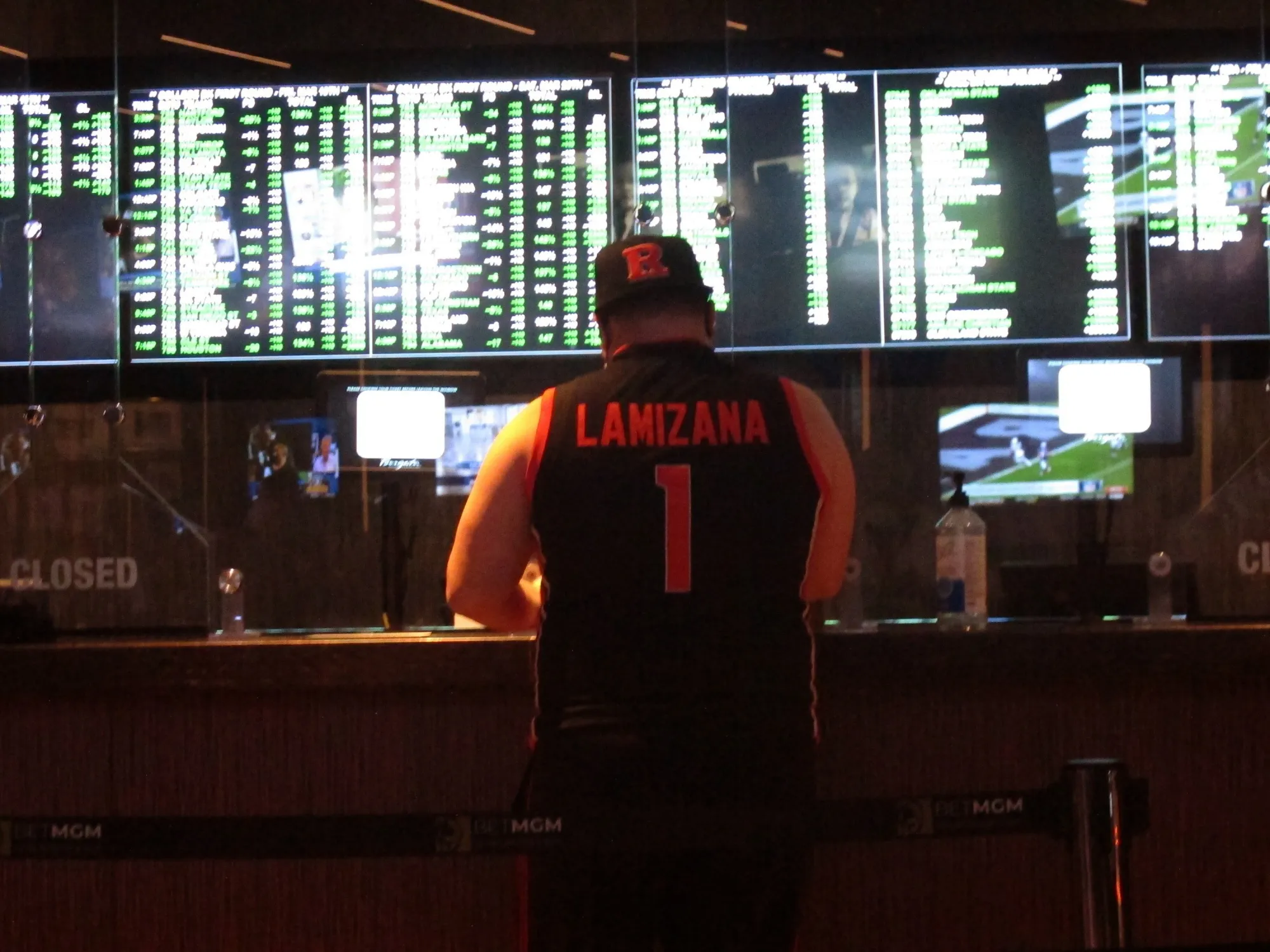 In this Friday, March 19, 2021, file photo, a man makes a sports bet at the Borgata casino in Atlantic City, N.J. On Wednesday, Oct. 20, 2021, the NFL announced it is spending $6.2 million on a responsible betting program with the National Council on Problem Gambling to teach people how to bet on sports responsibly and to fund and expand treatment and prevention programs for compulsive gambling.(AP Photo/Wayne Parry, File)