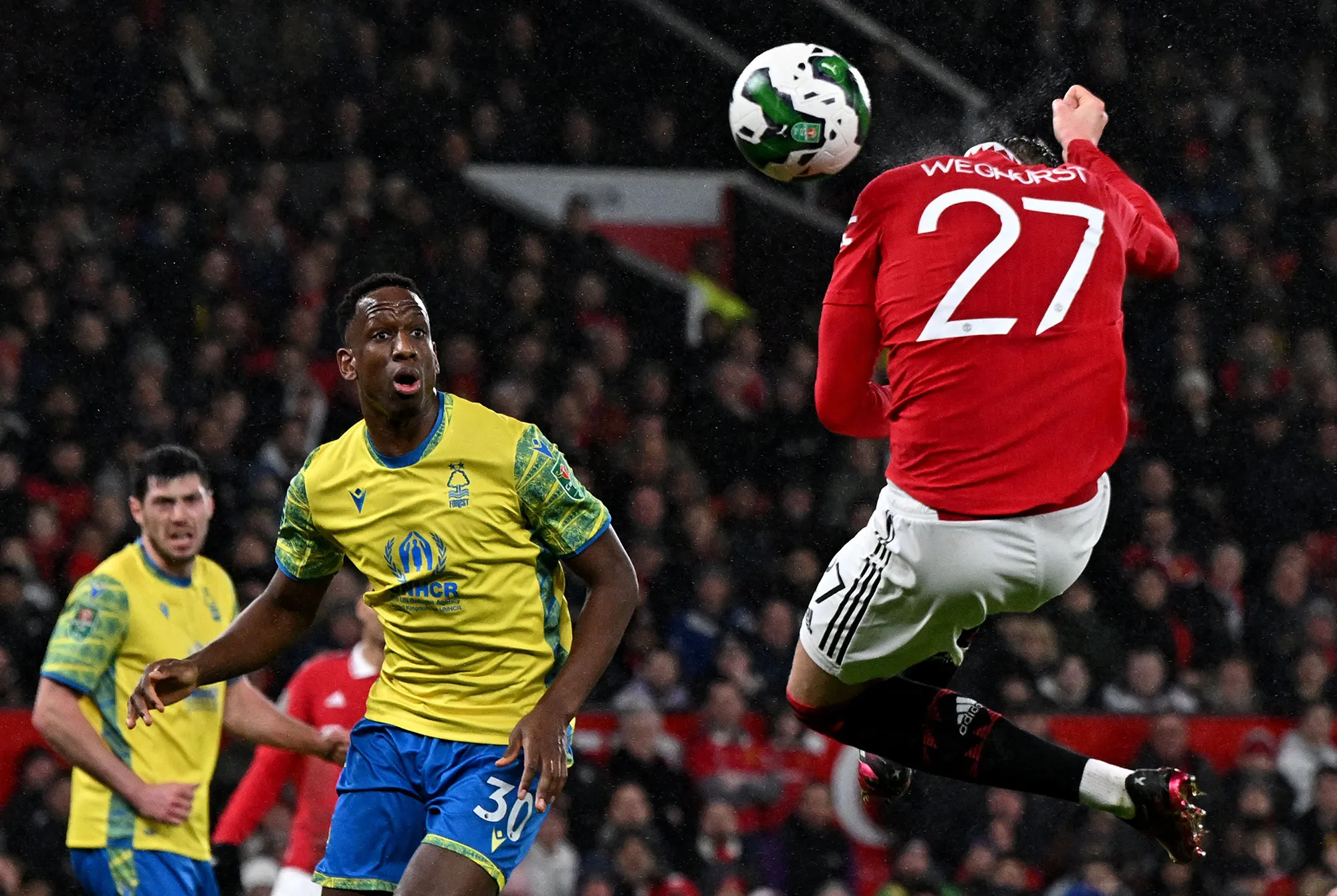 Manchester United’s Wout Weghorst heads the ball towards goal, at Old Trafford in Manchester, on Feb. 1.