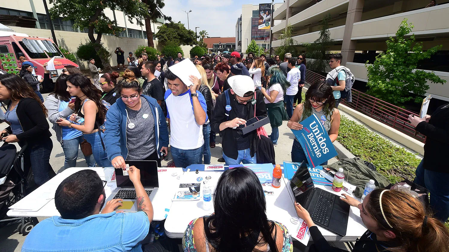 Students line up for voter registration forms or a chance to meet with celebrities visiting East Los Angeles College for the “Rock the Campus for Bernie” event in Monterey Park, California, on May 10, 2016.
