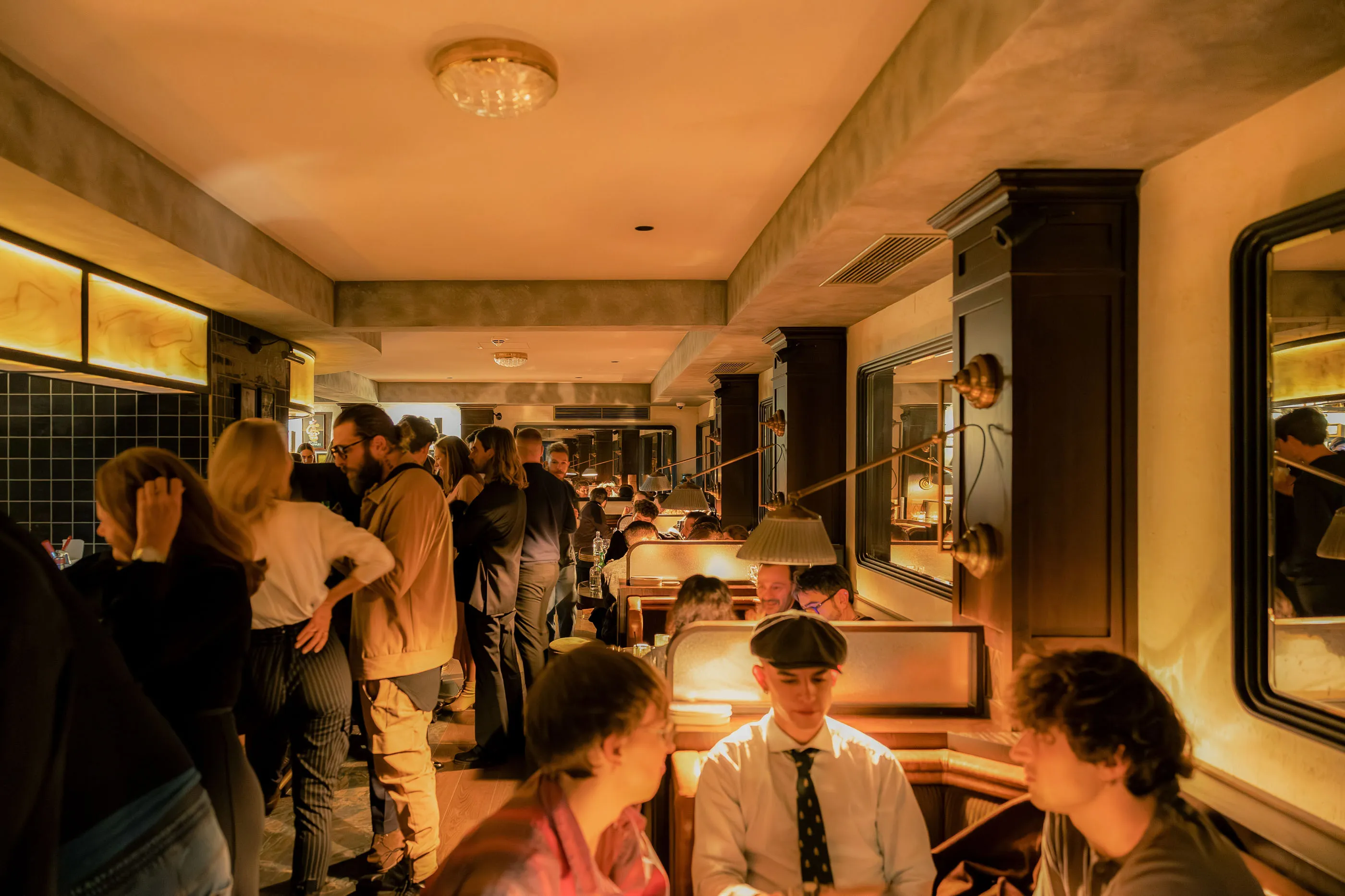 Young people congregate during a party at Salon Paradise, the bar at the Hoxton Vienna.