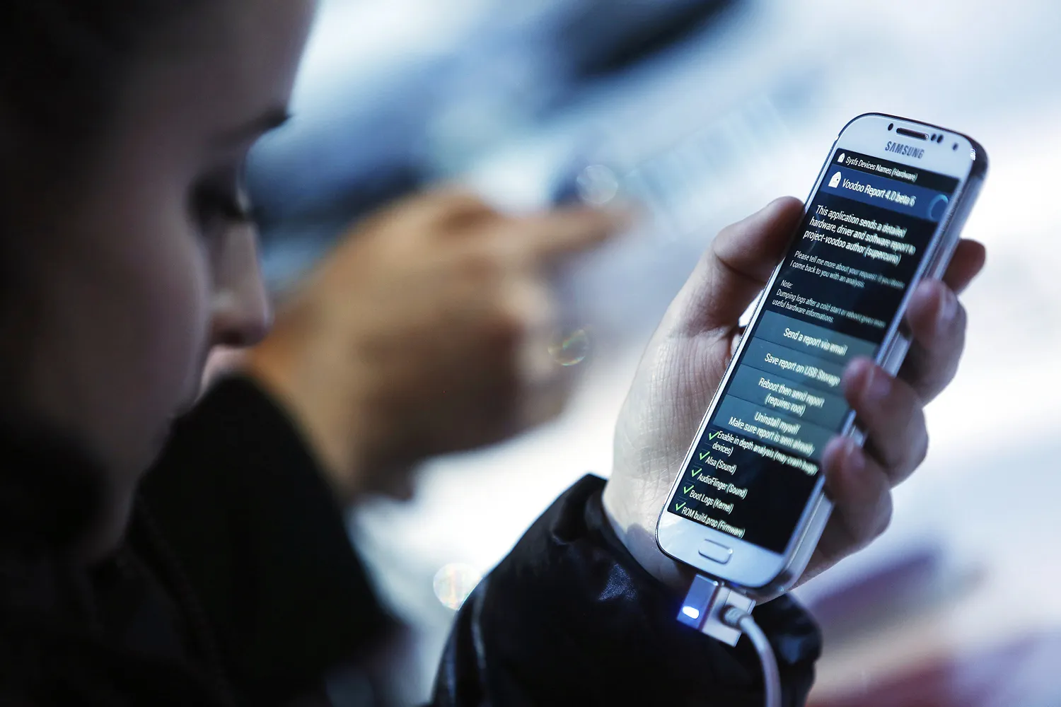 Attendees view the Samsung Electronics Co. Galaxy S4 smartphone during an event at Radio City Music Hall in New York, U.S., on Thursday, March 14, 2013.
