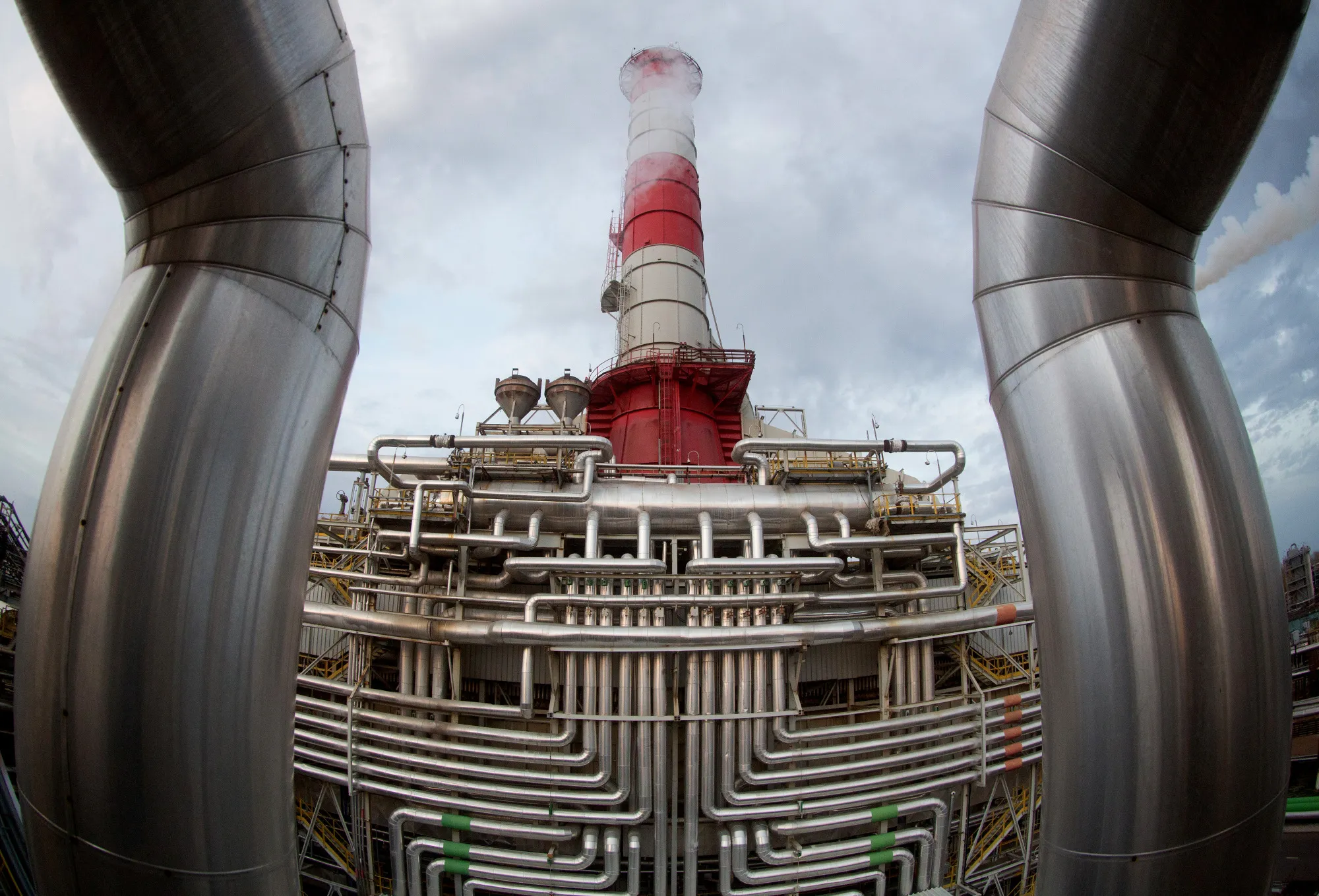 Metal pipes surround the base of the hydrogen production facility at the Bashneft-Ufaneftekhim oil refinery, operated by Bashneft PAO, in Ufa, Russia.