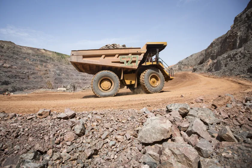 A dumper truck moves excavated rock ore in the Loulo-Gounkoto gold mining complex in Mali, in November 2013.