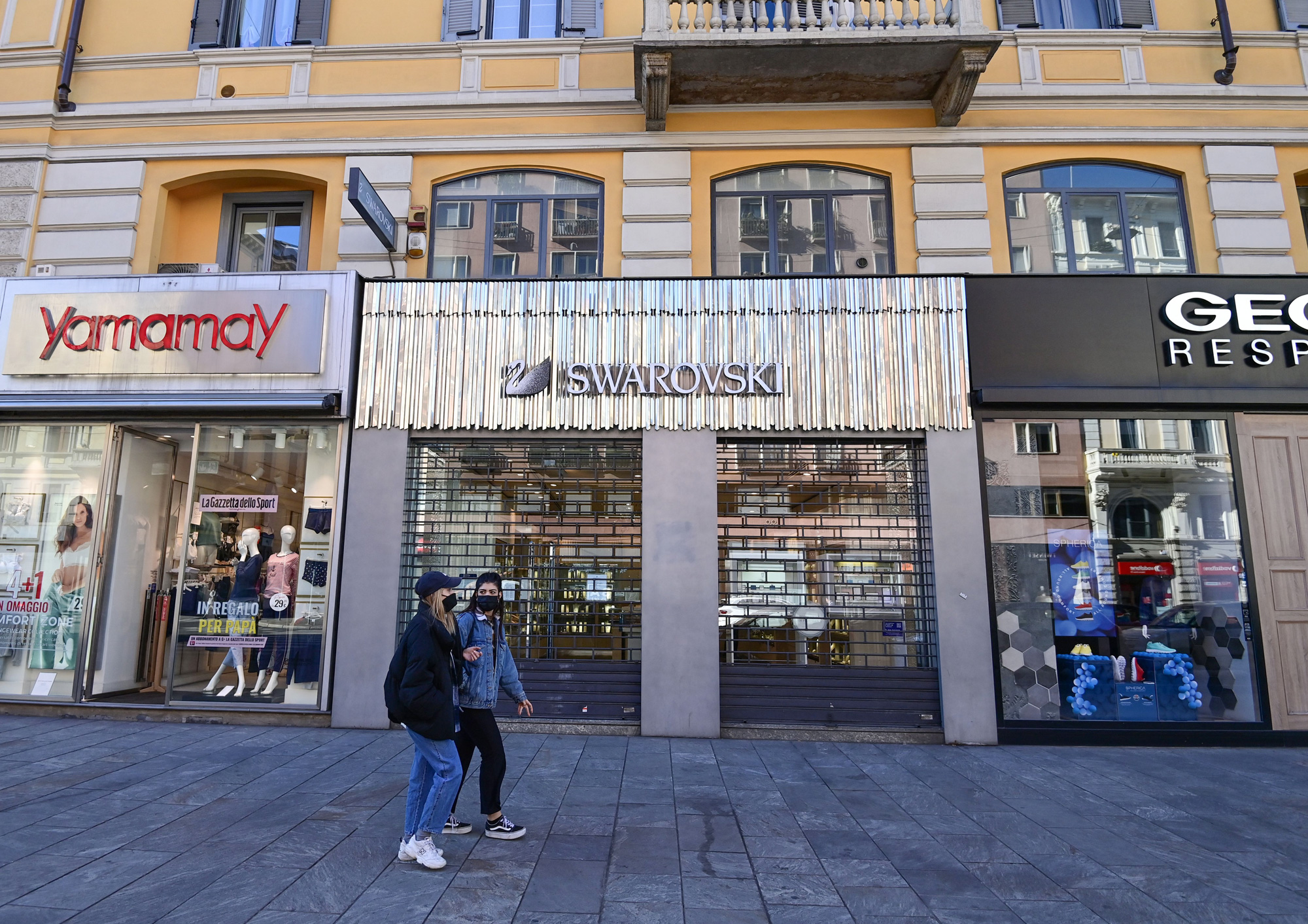 Closed stores in Milan, Italy, where the government&nbsp;has spent over 130 billion euros to support the economy during the pandemic.