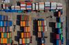 Shipping containers sit stacked in this aerial photograph taken above the Uiwang Inland Container Depot (ICD) in Uiwang, South Korea, on Wednesday, April 22, 2020. South Korea’s exports plunged this month so far, underscoring the hit to global trade caused by lockdowns to combat the global coronavirus pandemic.