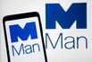 In this photo illustration, the Man Group plc logo is