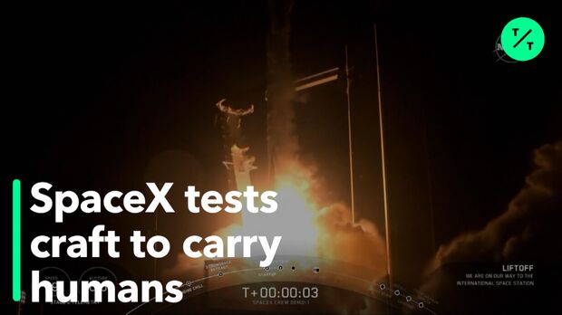 SpaceX Crew Dragon Docks With International Space Station Bloomberg