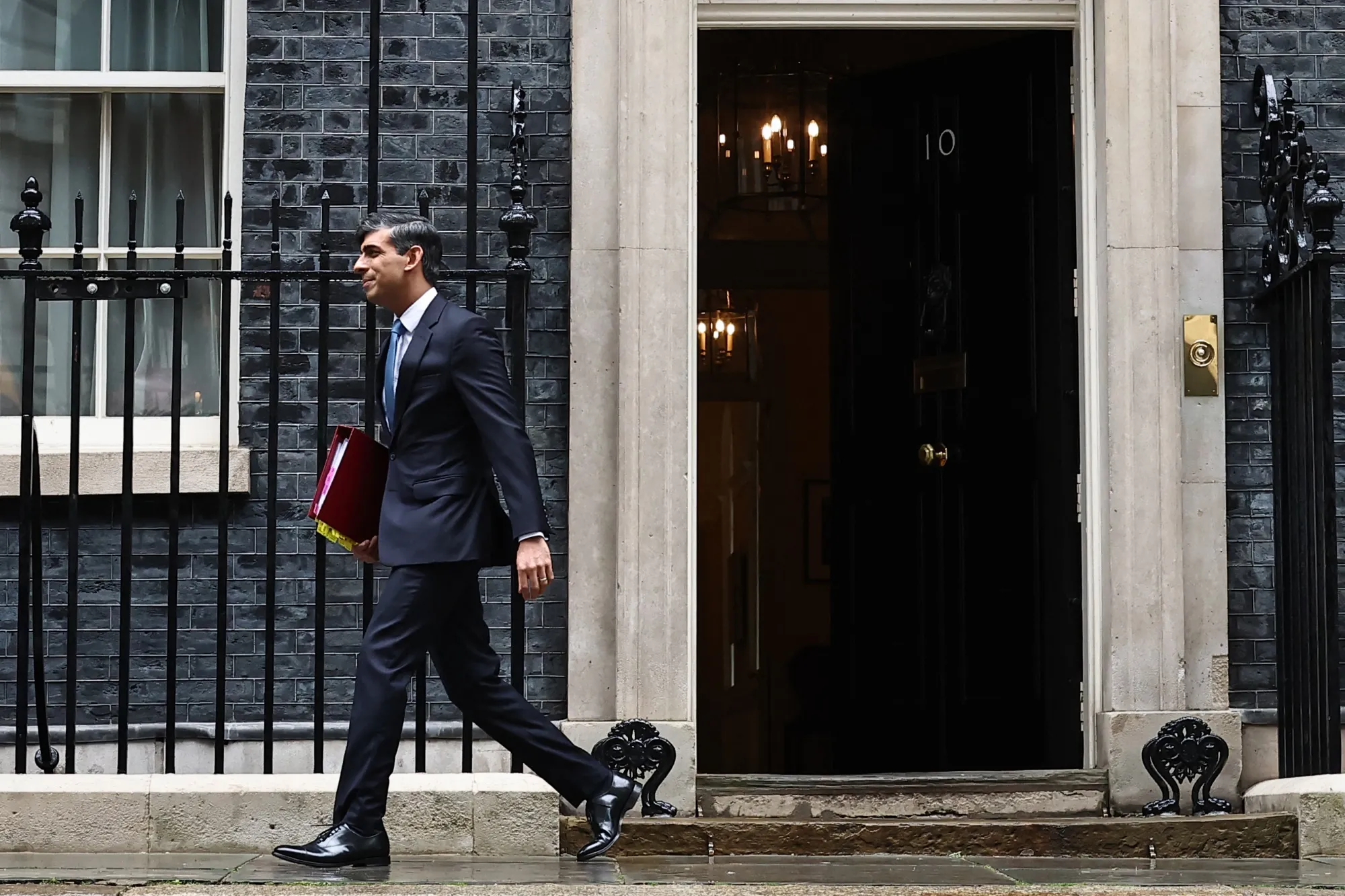 Britain's Prime Minister Rishi Sunak leaves 10 Downing Street to take part in the weekly session of Prime Minister's Questions in the House of Commons.