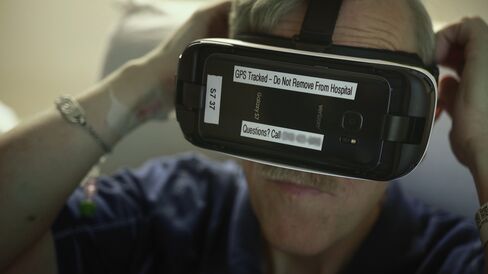 Ronald Yarbrough tries out a VR headset at Cedars-Sinai Medical Center in Los Angeles.