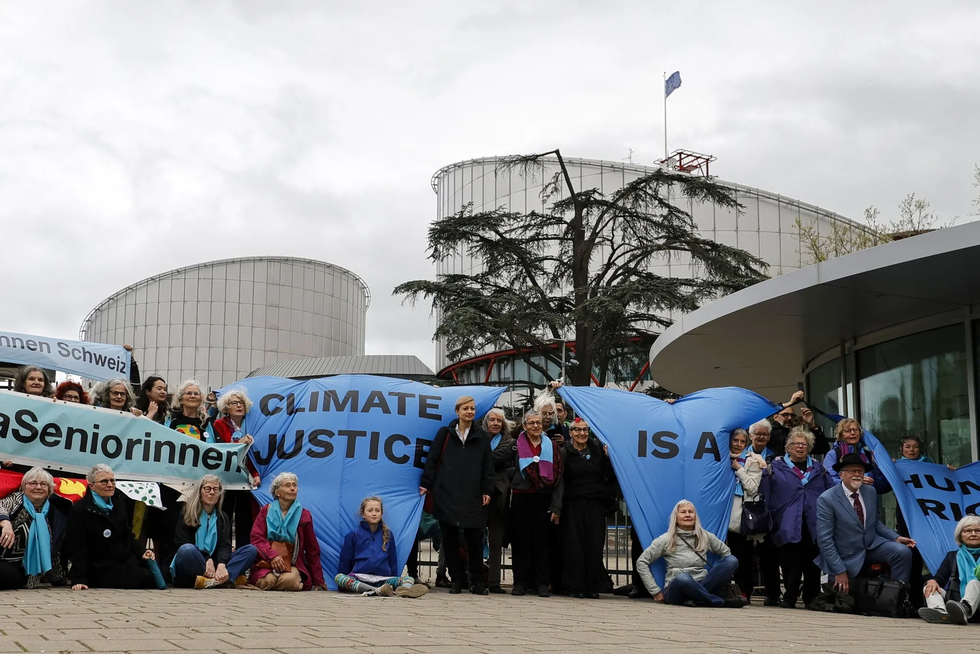 Members of KlimaSeniorinnen Schweiz (Senior Women for Climate Protection Switzerland)&nbsp;outside the European Court of Human Rights before the judgement in their&nbsp;case&nbsp;in Strasbourg, on&nbsp;April 9.