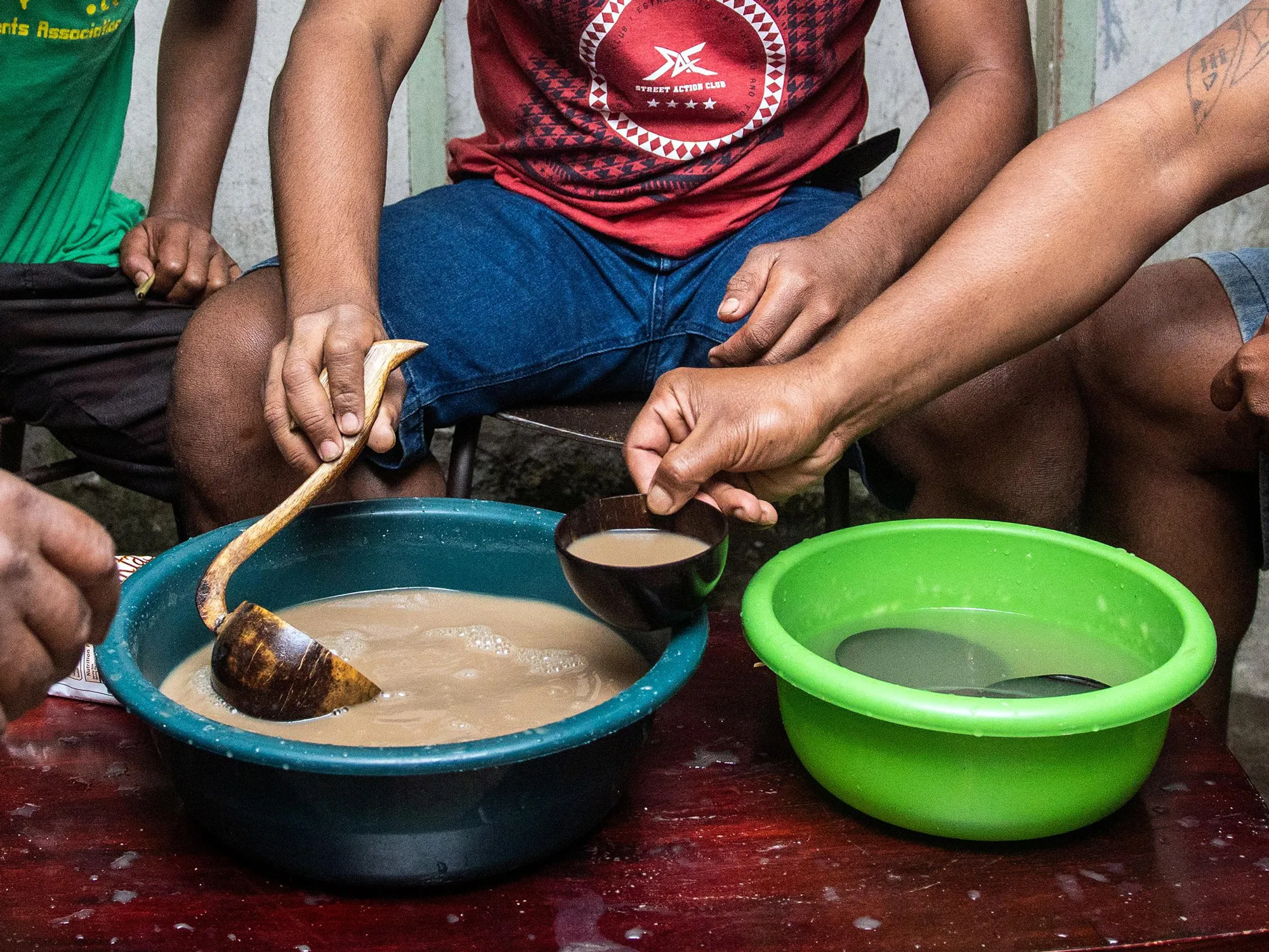 Residents drink kava in Suva, Fiji.