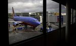 A Southwest aircraft stands on the tarmac at San Francisco International Airport.