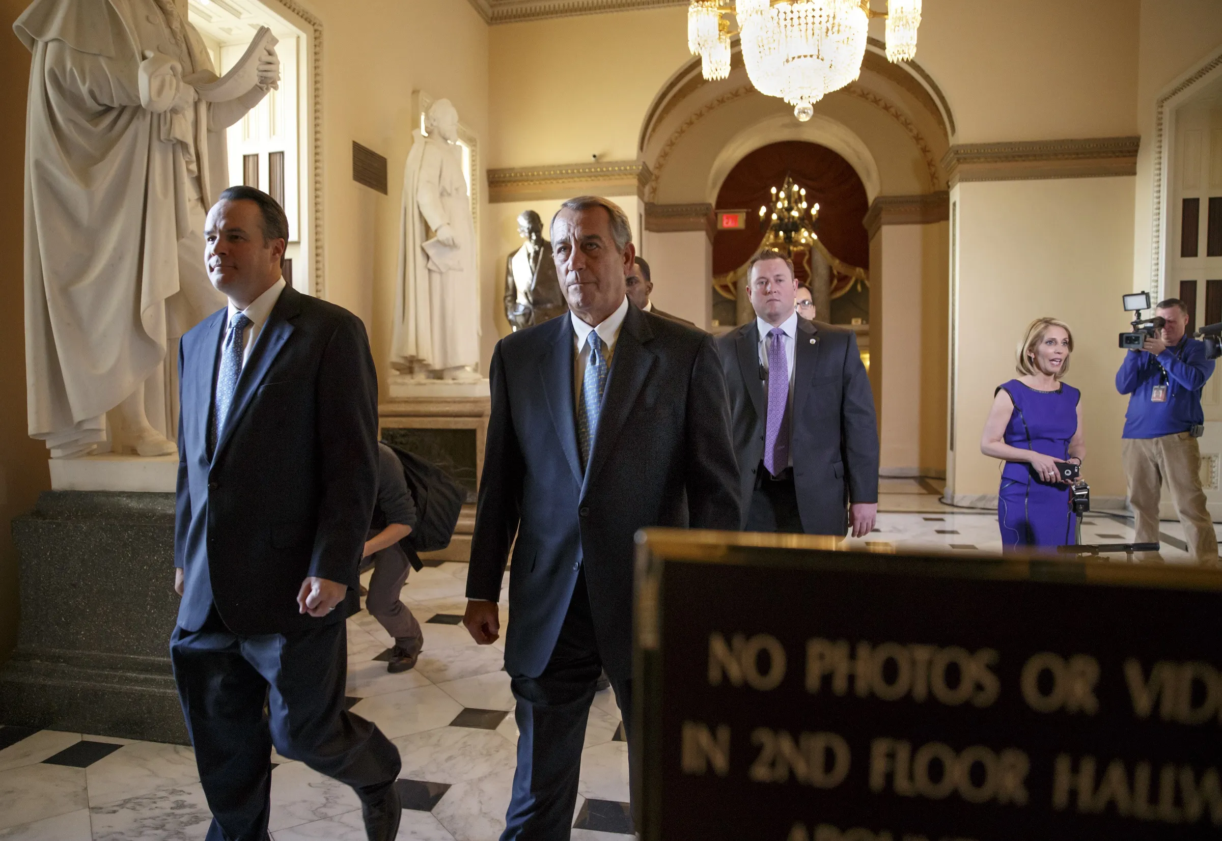 Speaker of the House John Boehner, R-Ohio, walks to the chamber.
