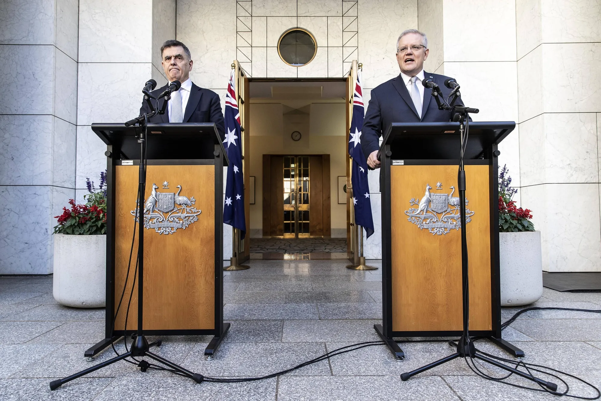 Scott Morrison, right, and Brendon Murphy&nbsp;during a press conference in Canberra on March 18.