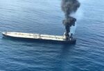 Smoke rises after a fire broke out on a Panama-registered oil tanker east of Sri Lanka, Thursday, Sept. 3.