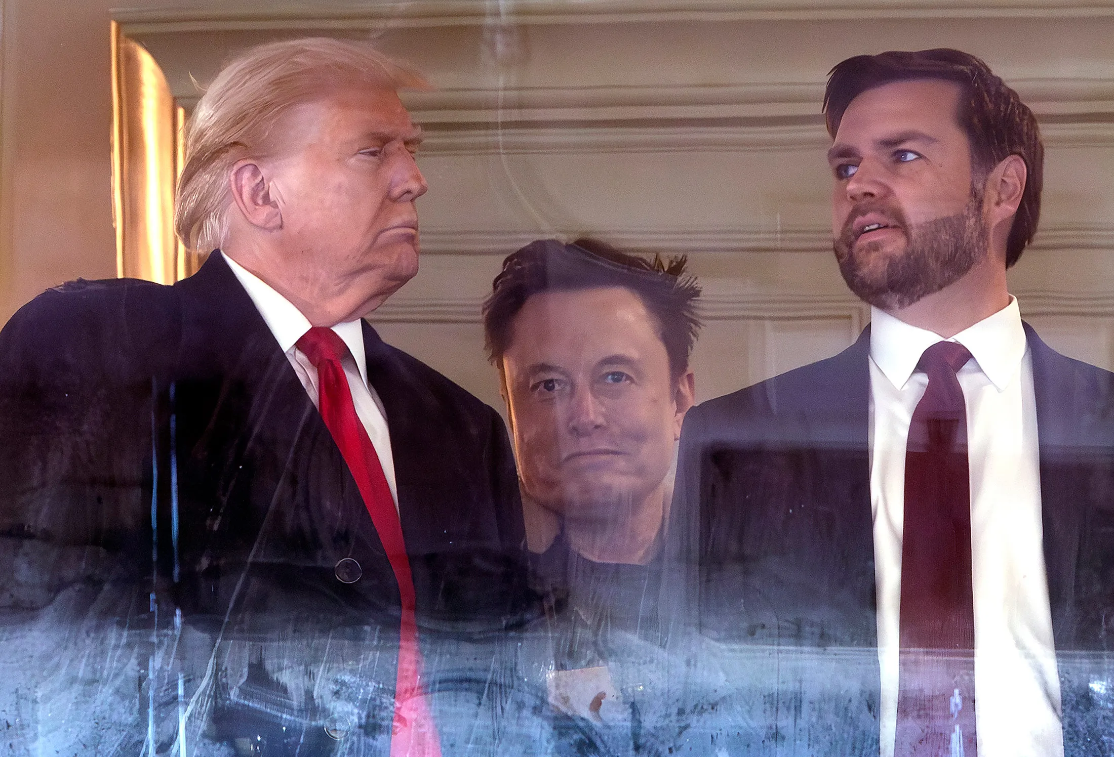 Playing the third wheel to Trump and Vance at the Army-Navy football game in December.