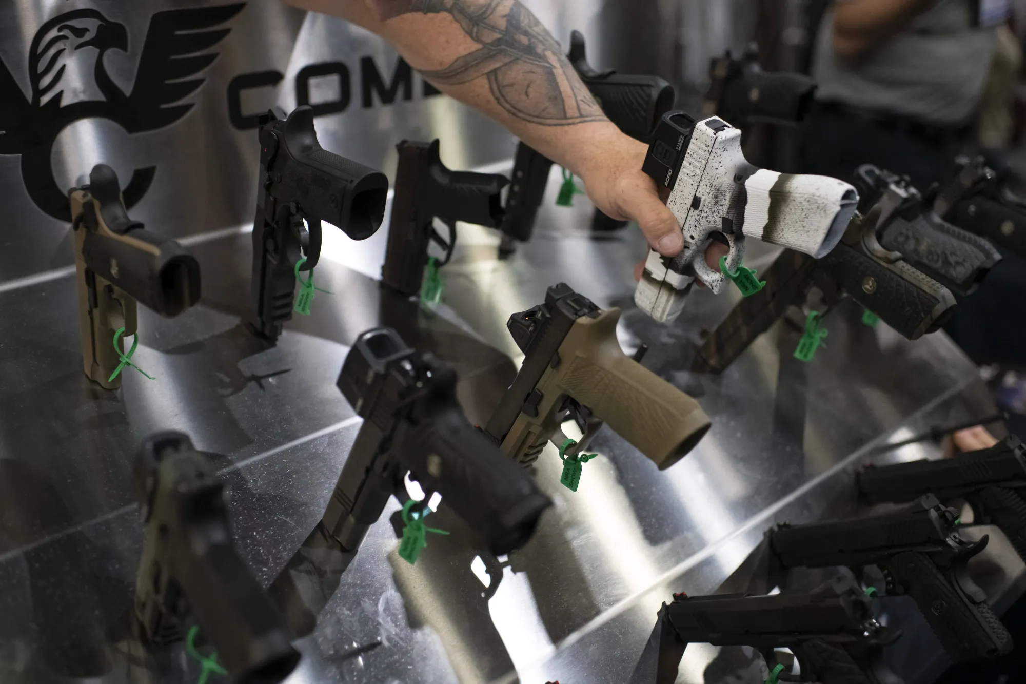 Pistols at the Wilson Combat booth during the National Rifle Association (NRA) annual convention in Houston, Texas.