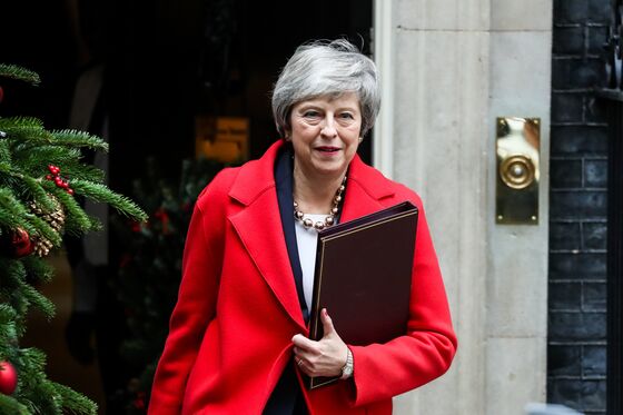 May Suffers Parliament Defeats Ahead of Key Vote: Brexit Update