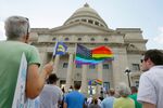 Demonstrators attend a rally on the steps of the Arkansas state Capitol in Little Rock, Ark., on March 31,  in protest of a bill that passed in the state House that critics say will lead to discrimination against gays and lesbians.

