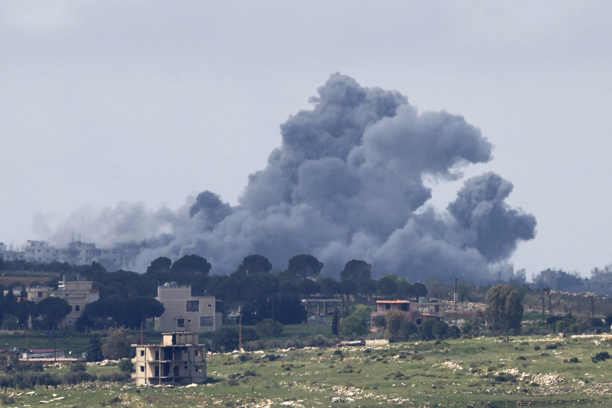 Smoke rises following strikes in southern Lebanon as seen from the Upper Galilee, in northern Israel on April 10. Photographer: Jalaa Marey/AFP/Getty Images