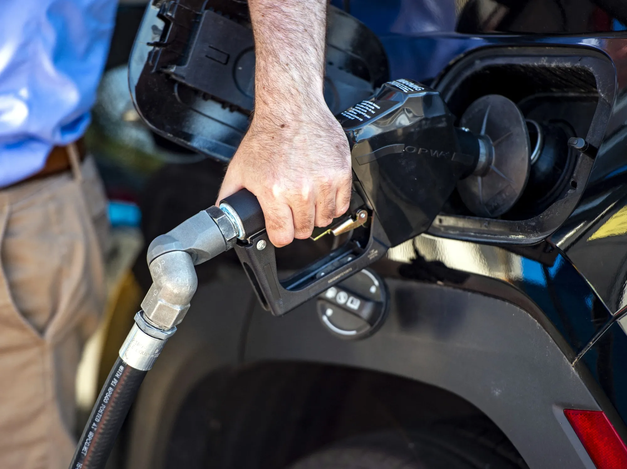 Falling prices at the pump aren’t the way recessions usually begin.
