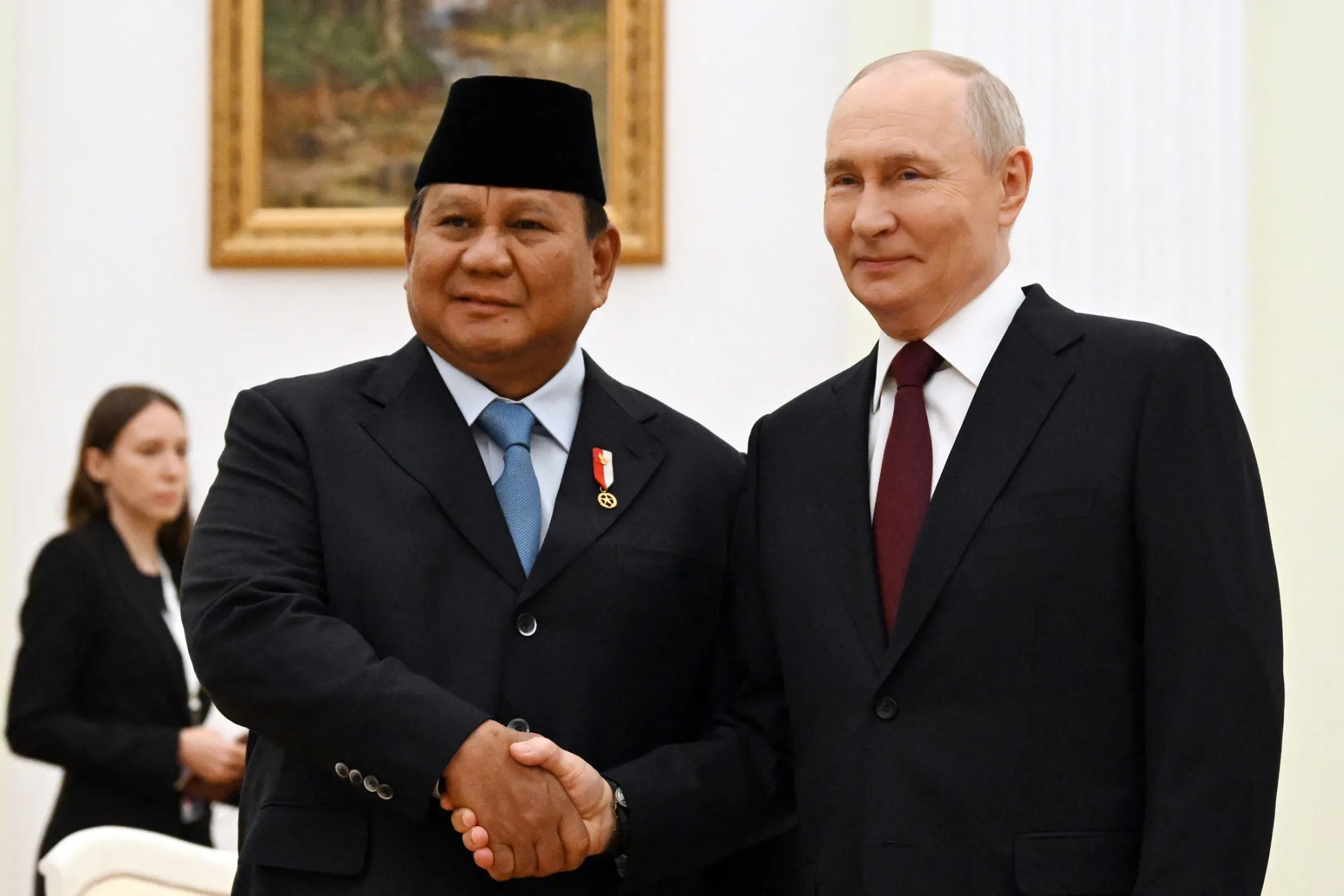 Vladimir Putin, right, greets Prabowo Subianto during a meeting in Moscow, on April 13