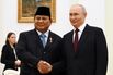Vladimir Putin, right, greets Prabowo Subianto during a meeting in Moscow, on April 13