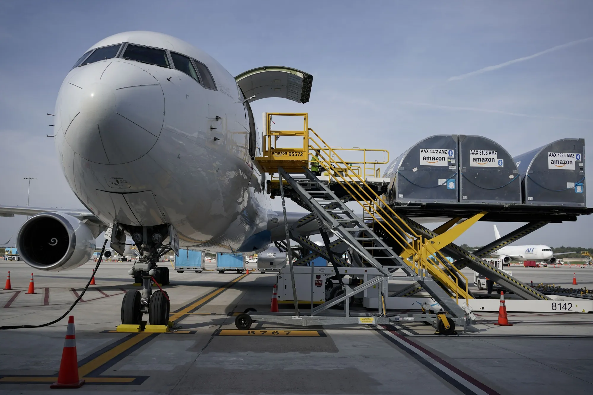 Cargo is loaded into an airplane at the Amazon Air Hub in Cincinnati.