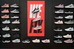 Nike Inc. sneakers are displayed for sale at a Dick's Sporting Goods Inc. store in Daly City, California, U.S..